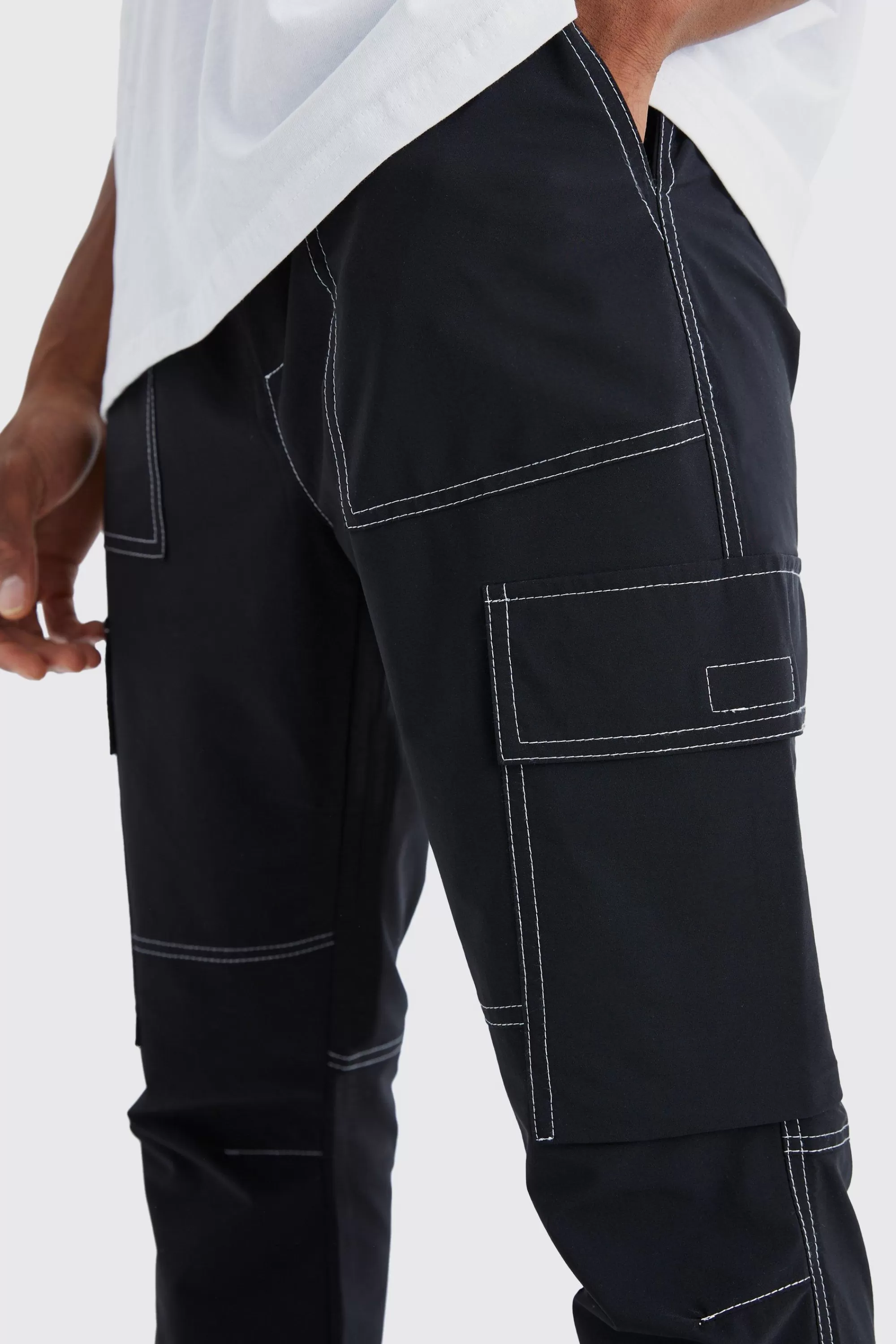 boohooMAN Elasticated Waist Slim Flare Contrast Stitch Cargo Trouser | UK