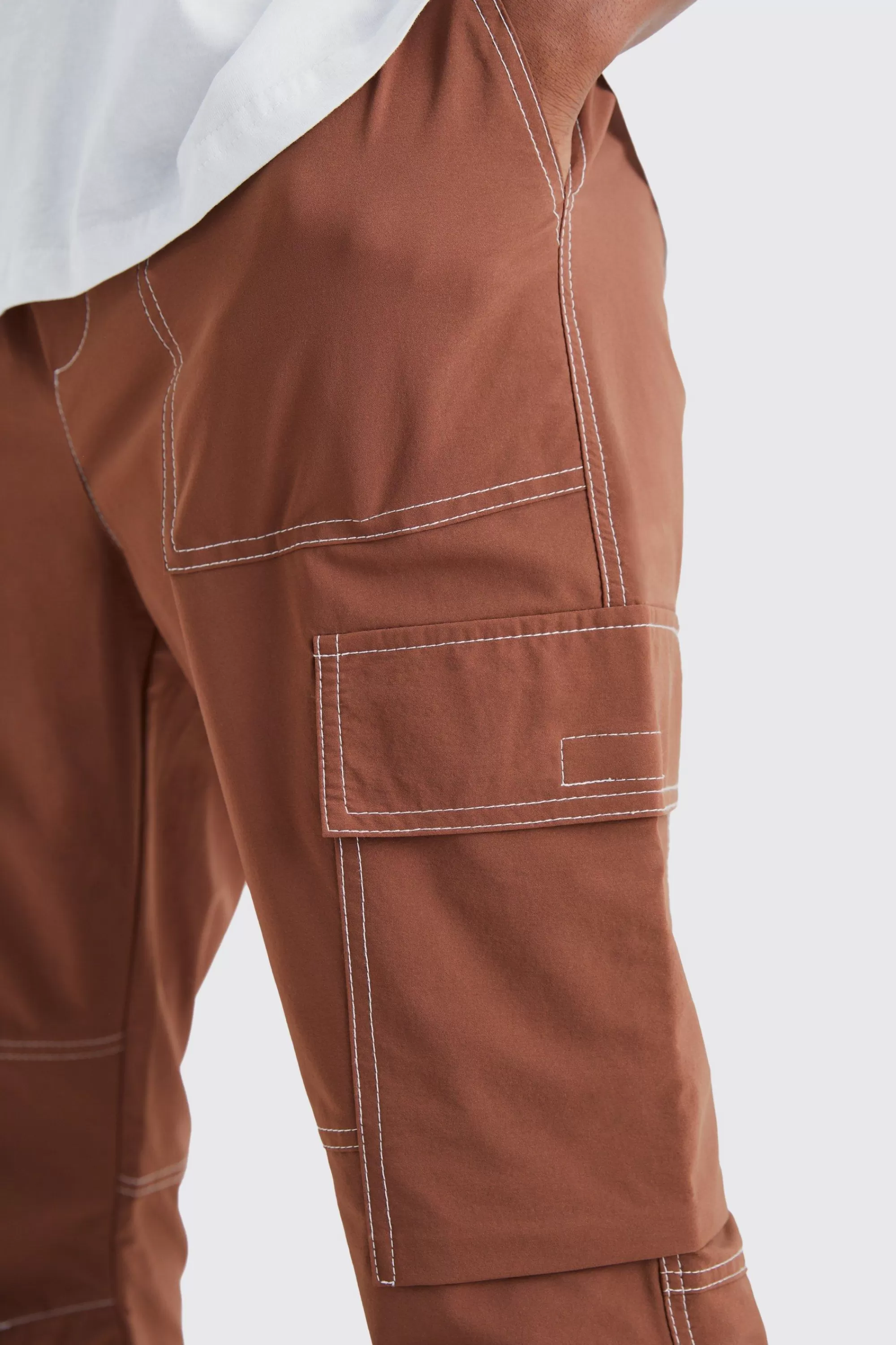 boohooMAN Elasticated Waist Slim Flare Contrast Stitch Cargo Trouser | UK