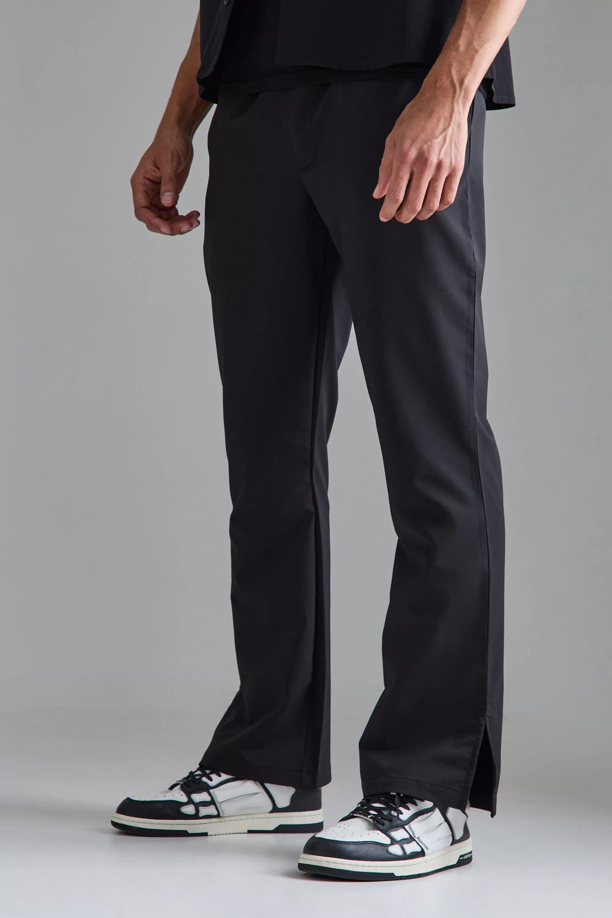 boohooMAN Elasticated Waist Split Hem Smart Trousers | UK