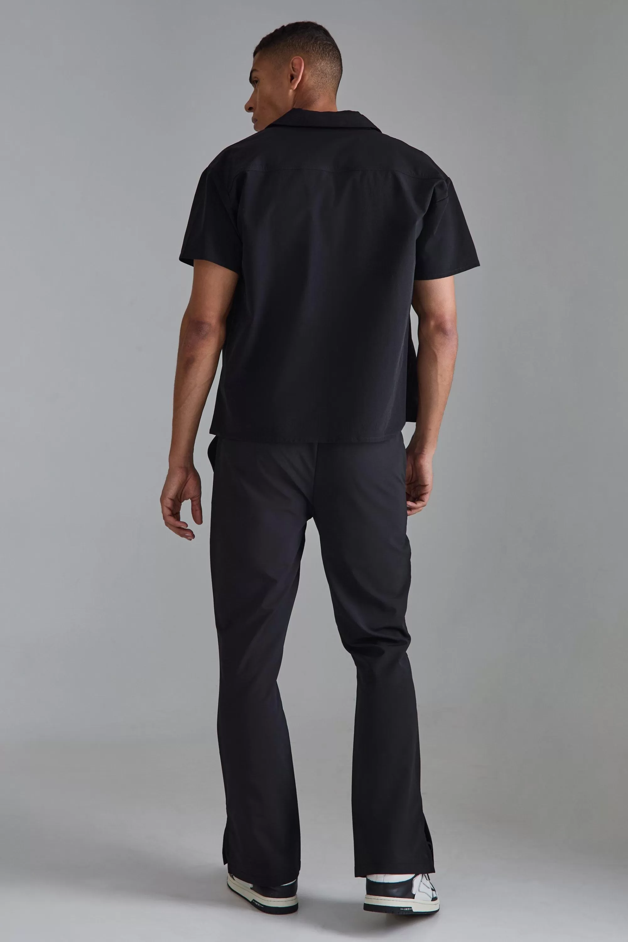 boohooMAN Elasticated Waist Split Hem Smart Trousers | UK