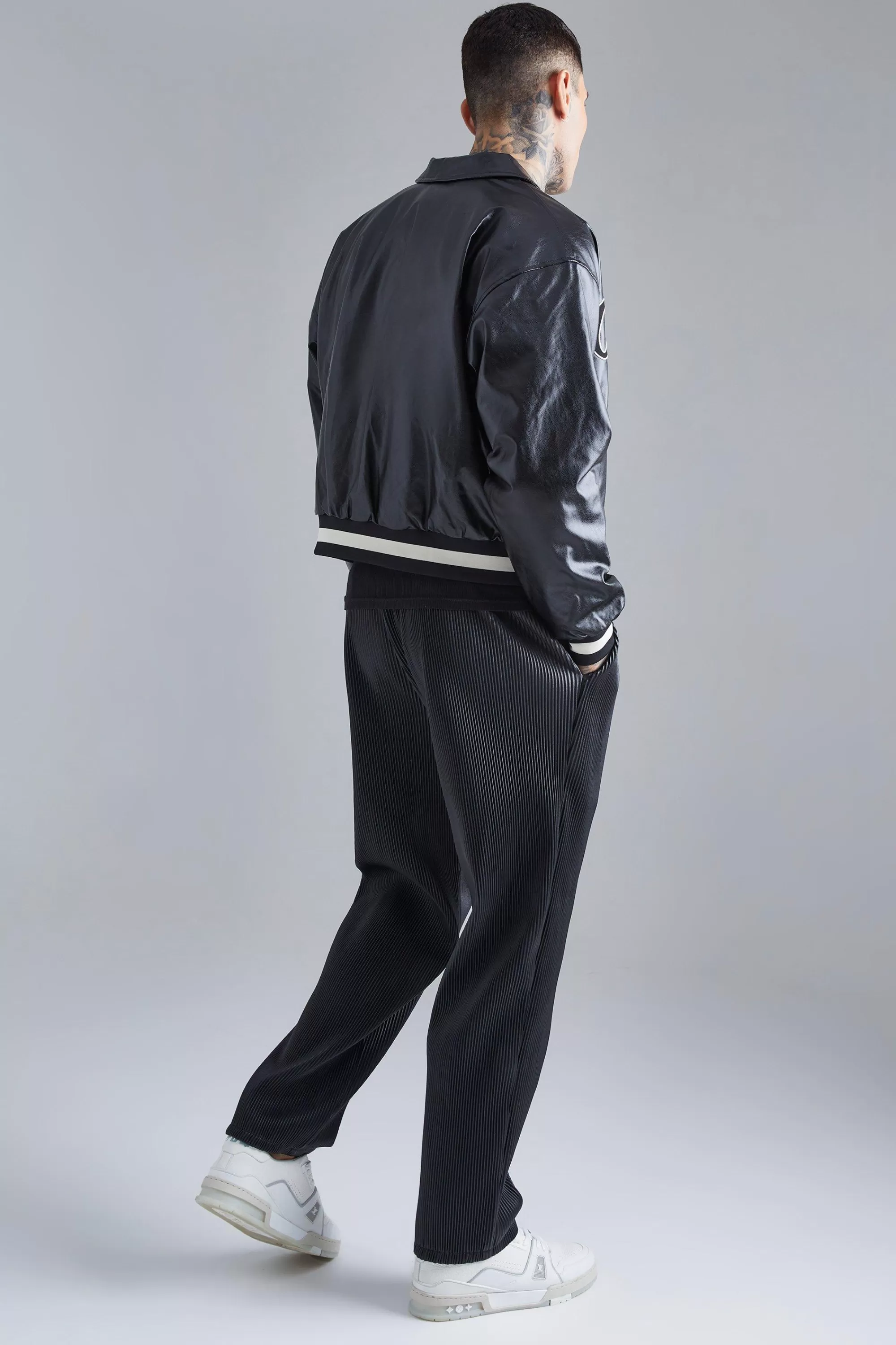 boohooMAN Elasticated Waist Straight Fit Pu Trousers | UK