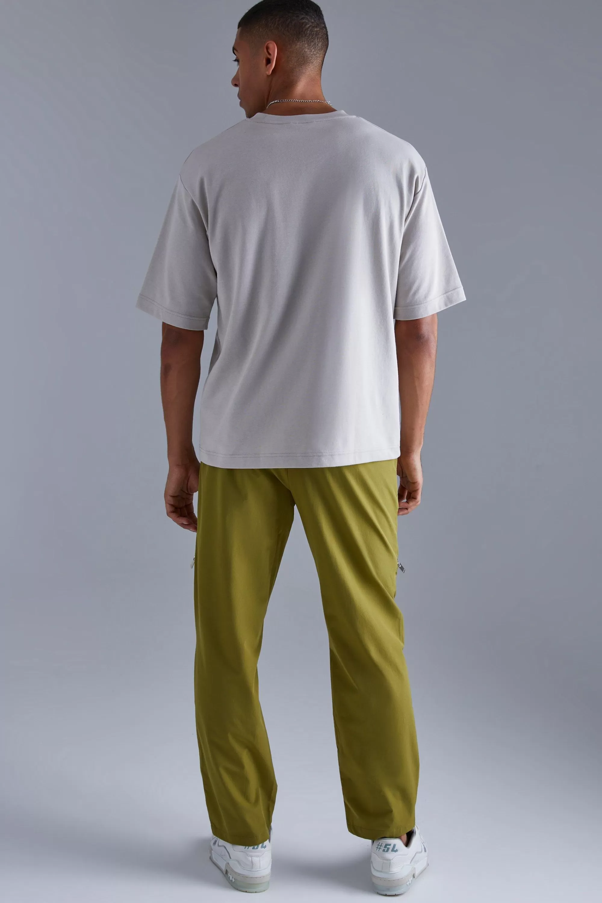 boohooMAN Elasticated Waist Straight Technical Stretch Panel Trouser | UK
