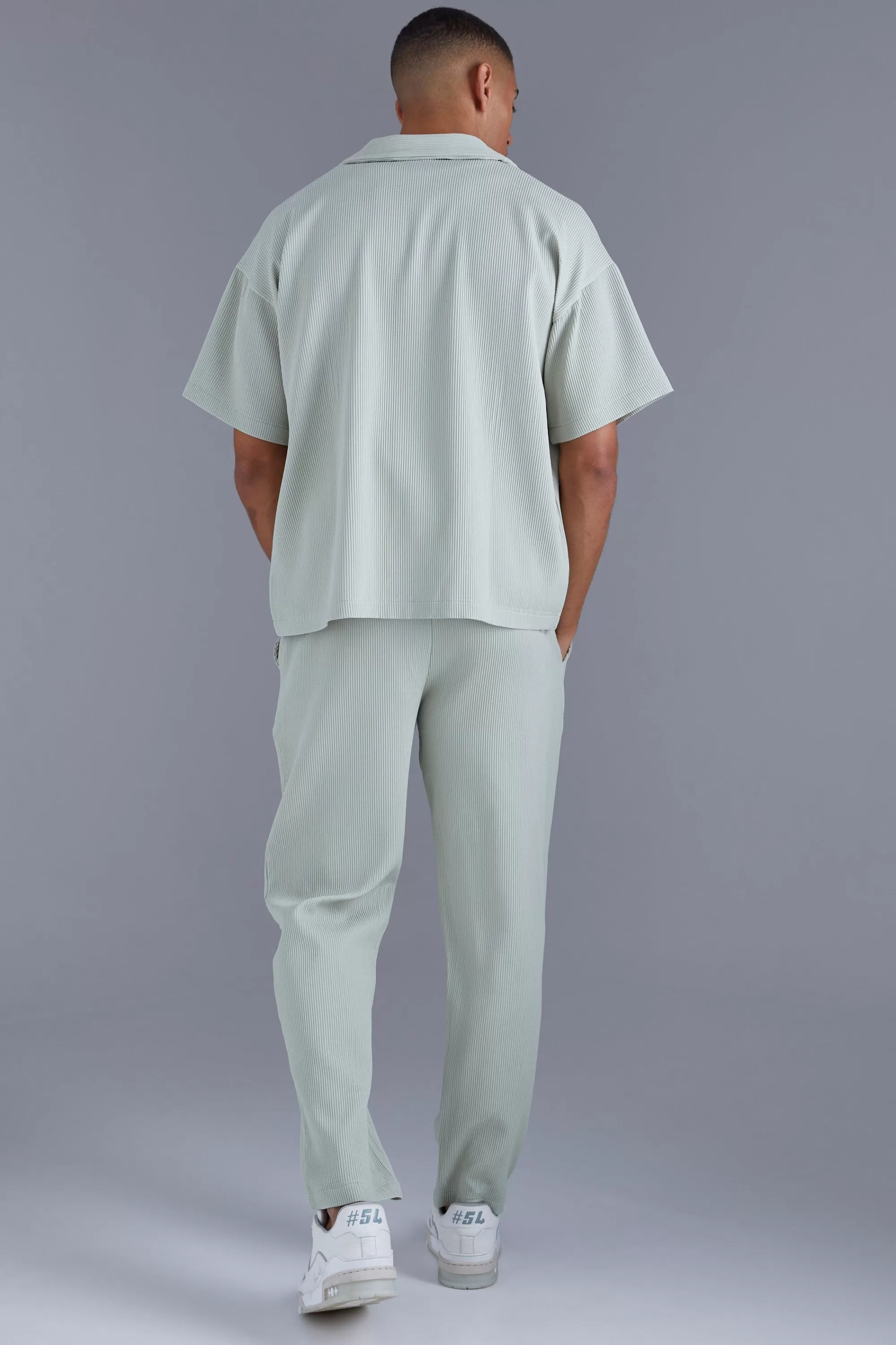 boohooMAN Elasticated Waist Tapered Fit Pleated Trouser | UK