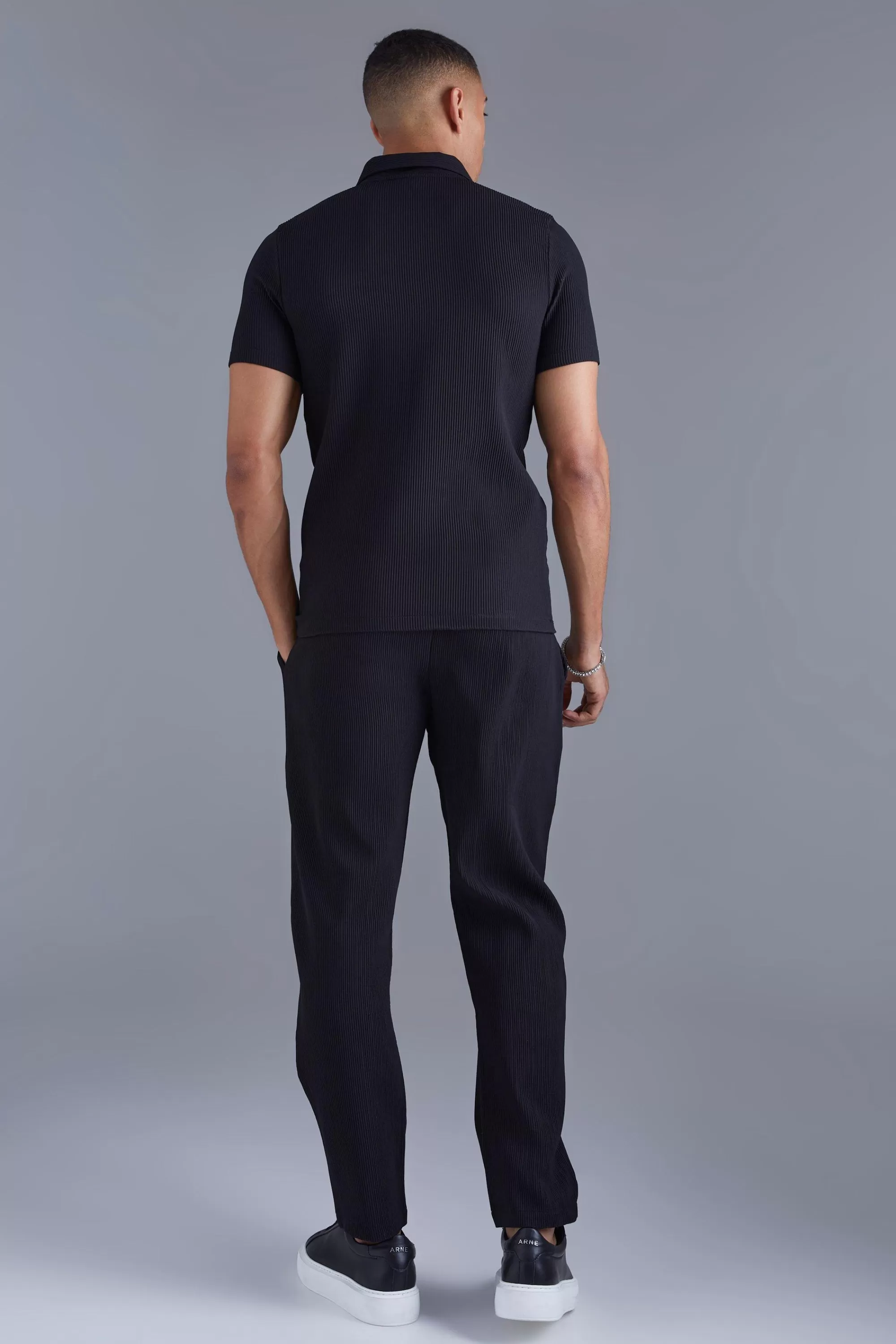 boohooMAN Elasticated Waist Tapered Fit Pleated Trouser | UK