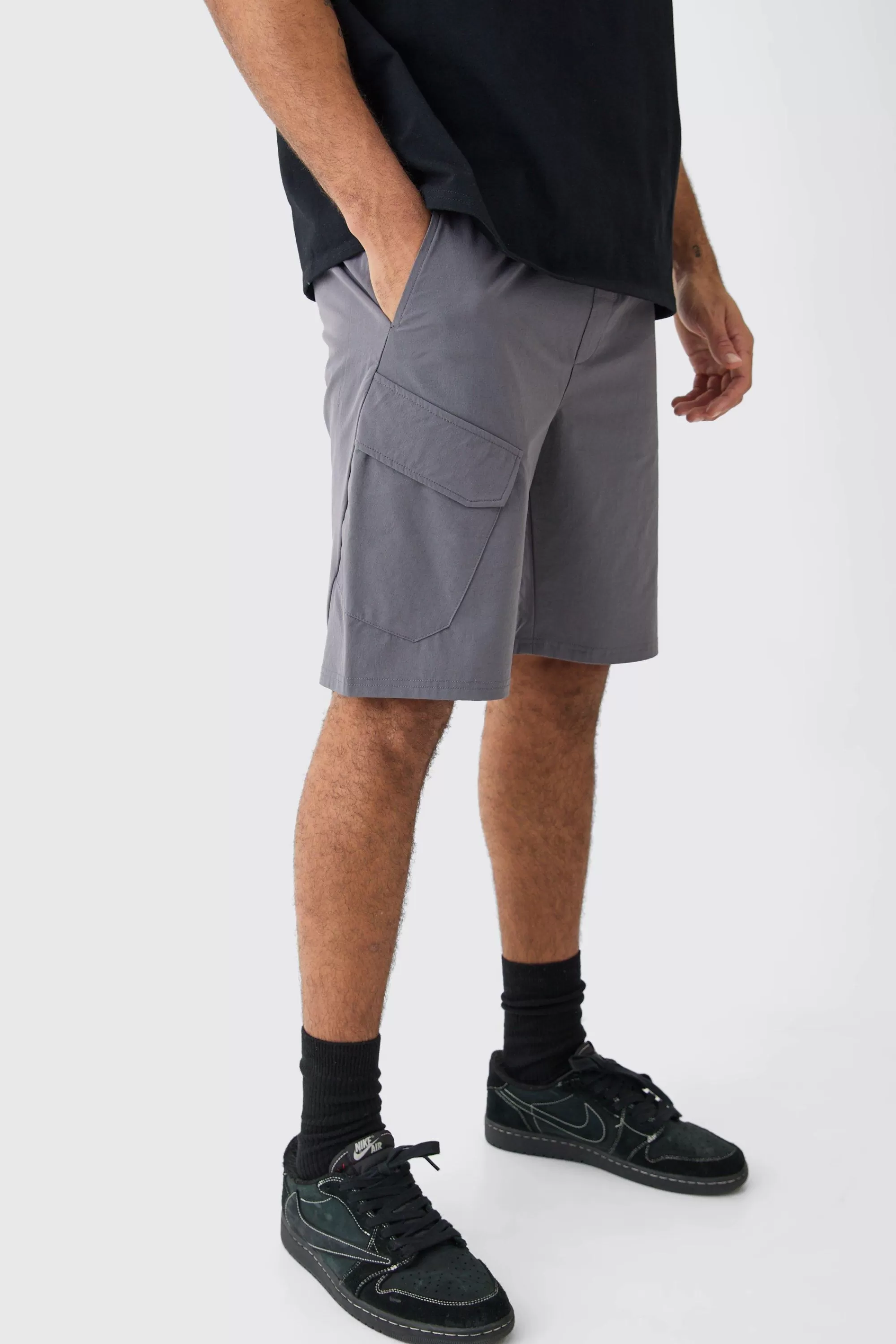 boohooMAN Elasticated Waist Technical Stretch Cargo Short | UK