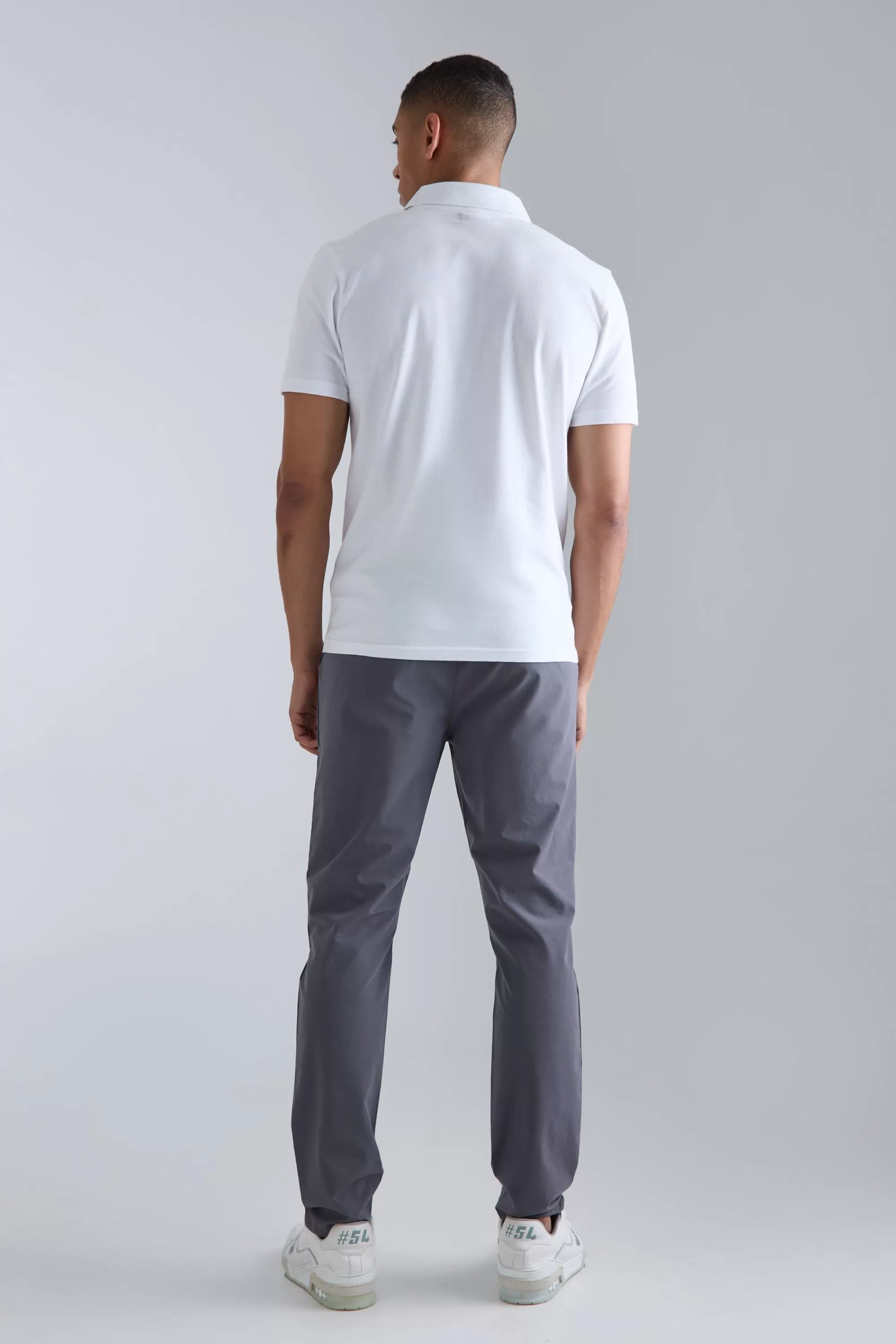 boohooMAN Elasticated Waist Technical Stretch Slim Trouser | UK