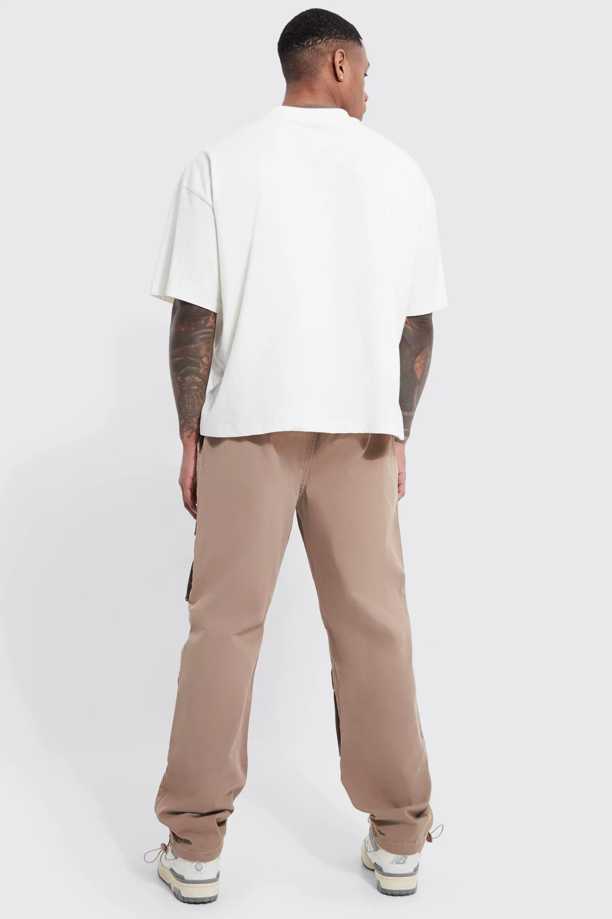 boohooMAN Elasticated Waist Zip Detail Multi Pocket Straight Fit Cargo Trousers | UK