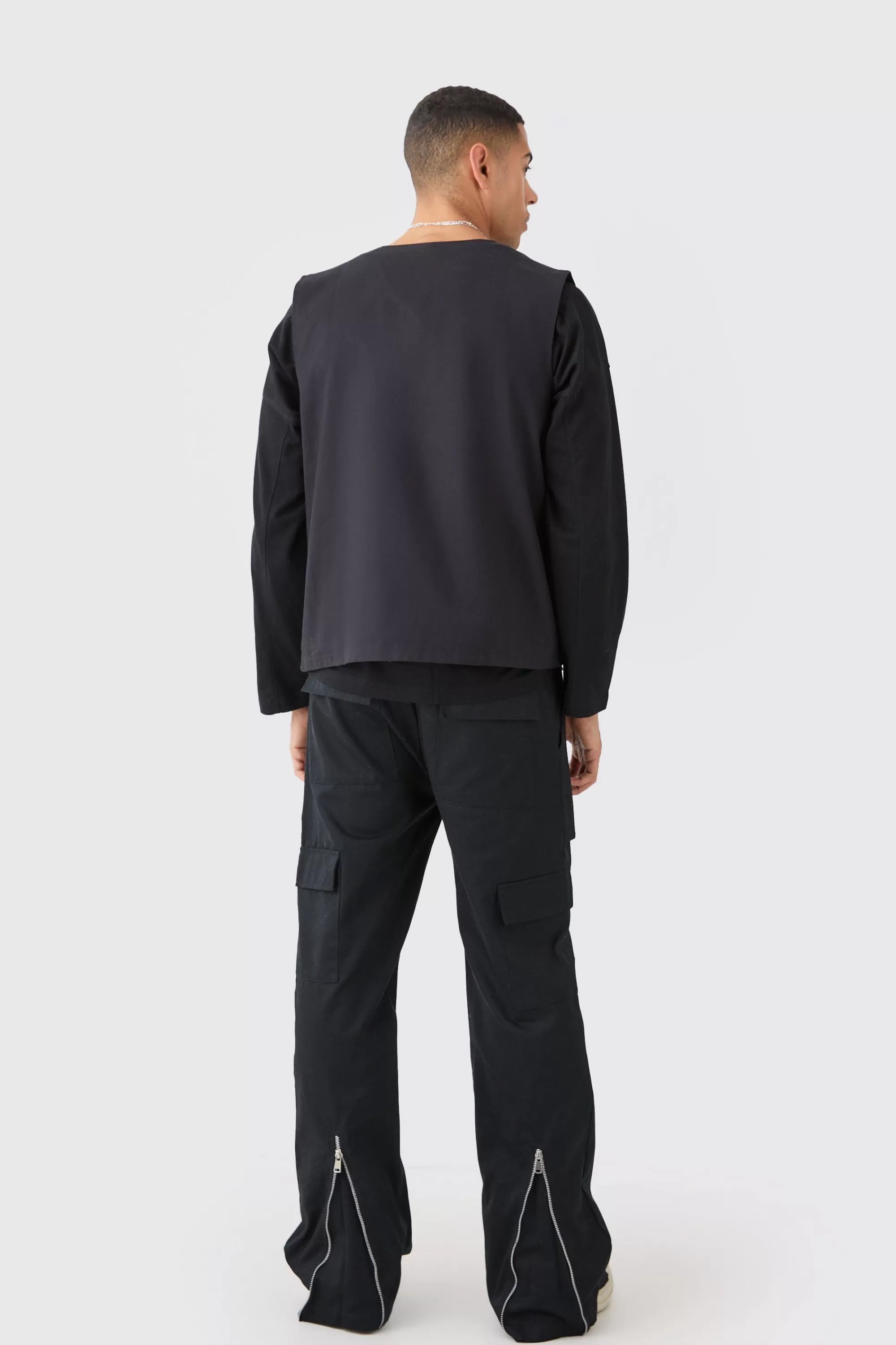 boohooMAN Elasticated Waist Zip Hem Flared Cargo Trousers | UK