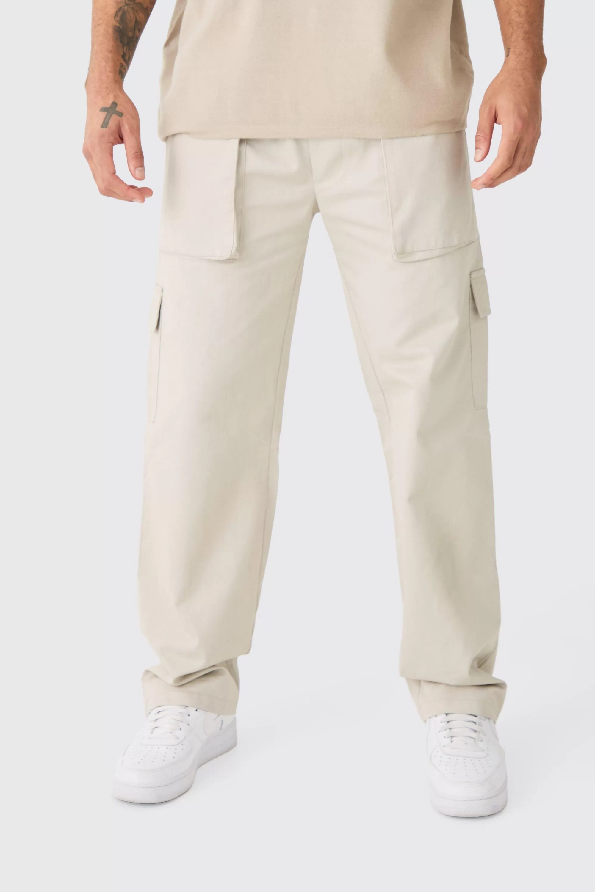 boohooMAN Elasticated Waist Zip Hem Flared Parachute Cargo Trousers | UK