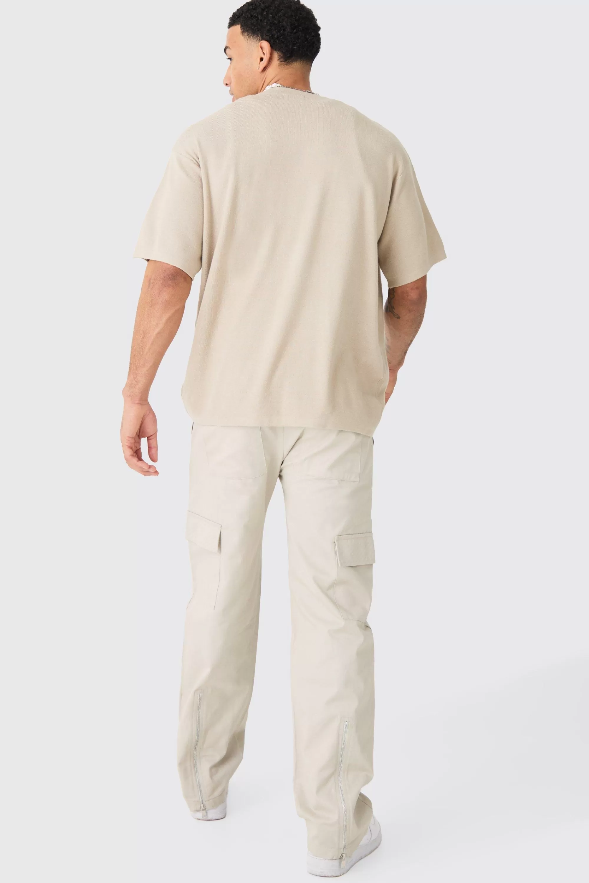 boohooMAN Elasticated Waist Zip Hem Flared Parachute Cargo Trousers | UK