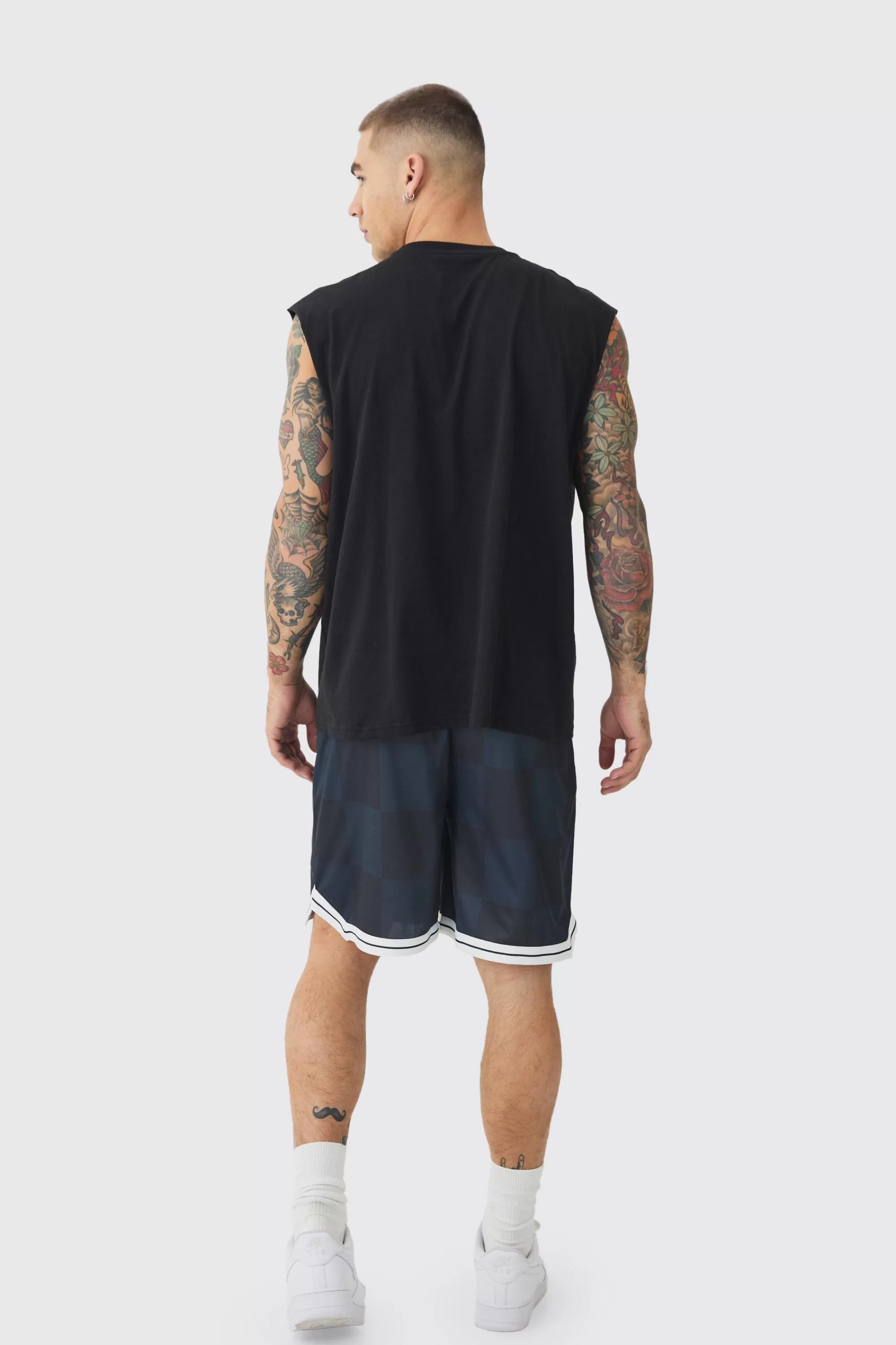 boohooMAN Embroidered Pique Mid Length Basketball Shorts | UK