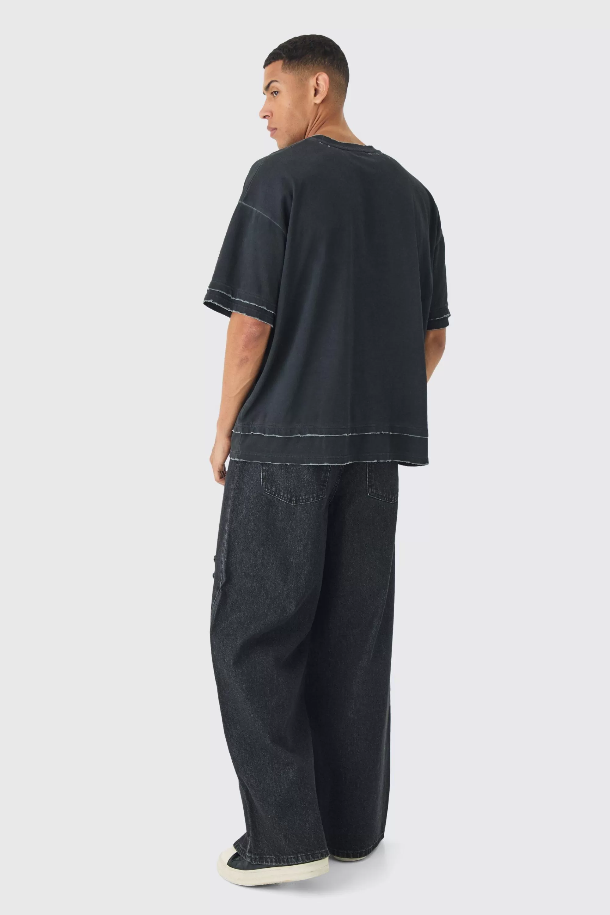 boohooMAN Extreme Baggy Rigid Ripped Jeans With Belt Detail | UK