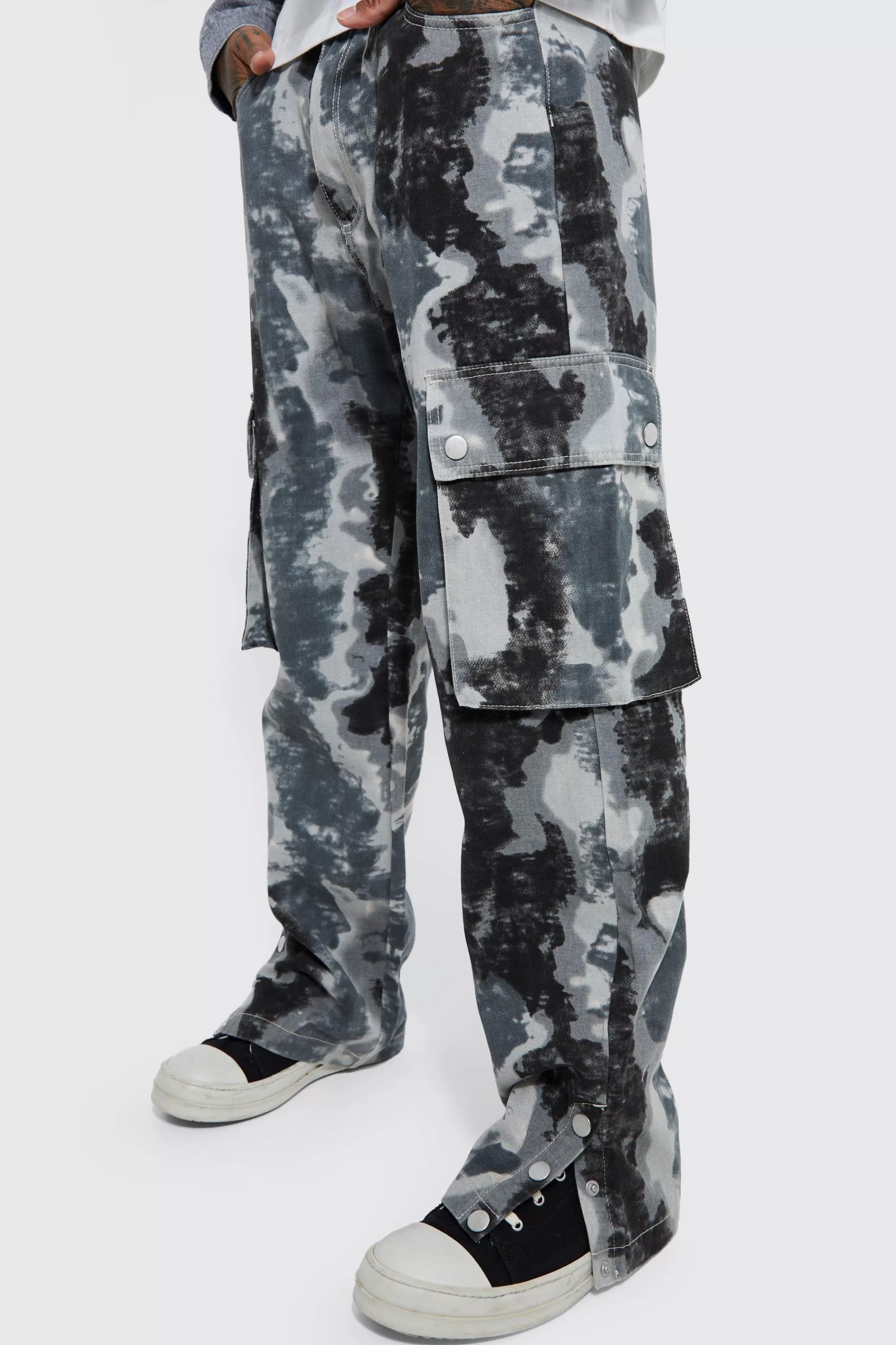 boohooMAN Fixed Relaxed Camo Cargo Popper Hem Trouser | UK