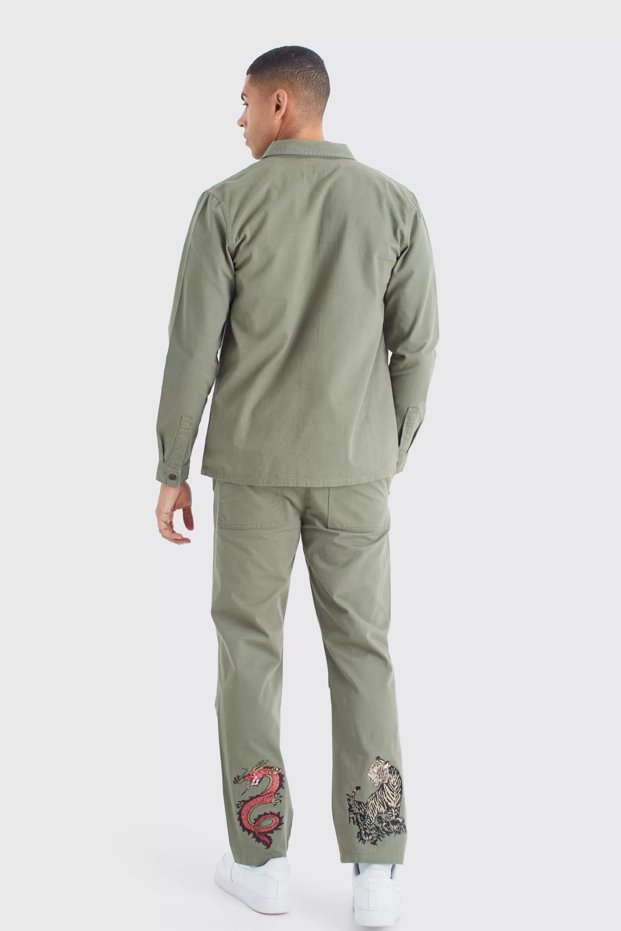 boohooMAN Fixed Waist Embroidered Twill Straight Leg Trouser | UK