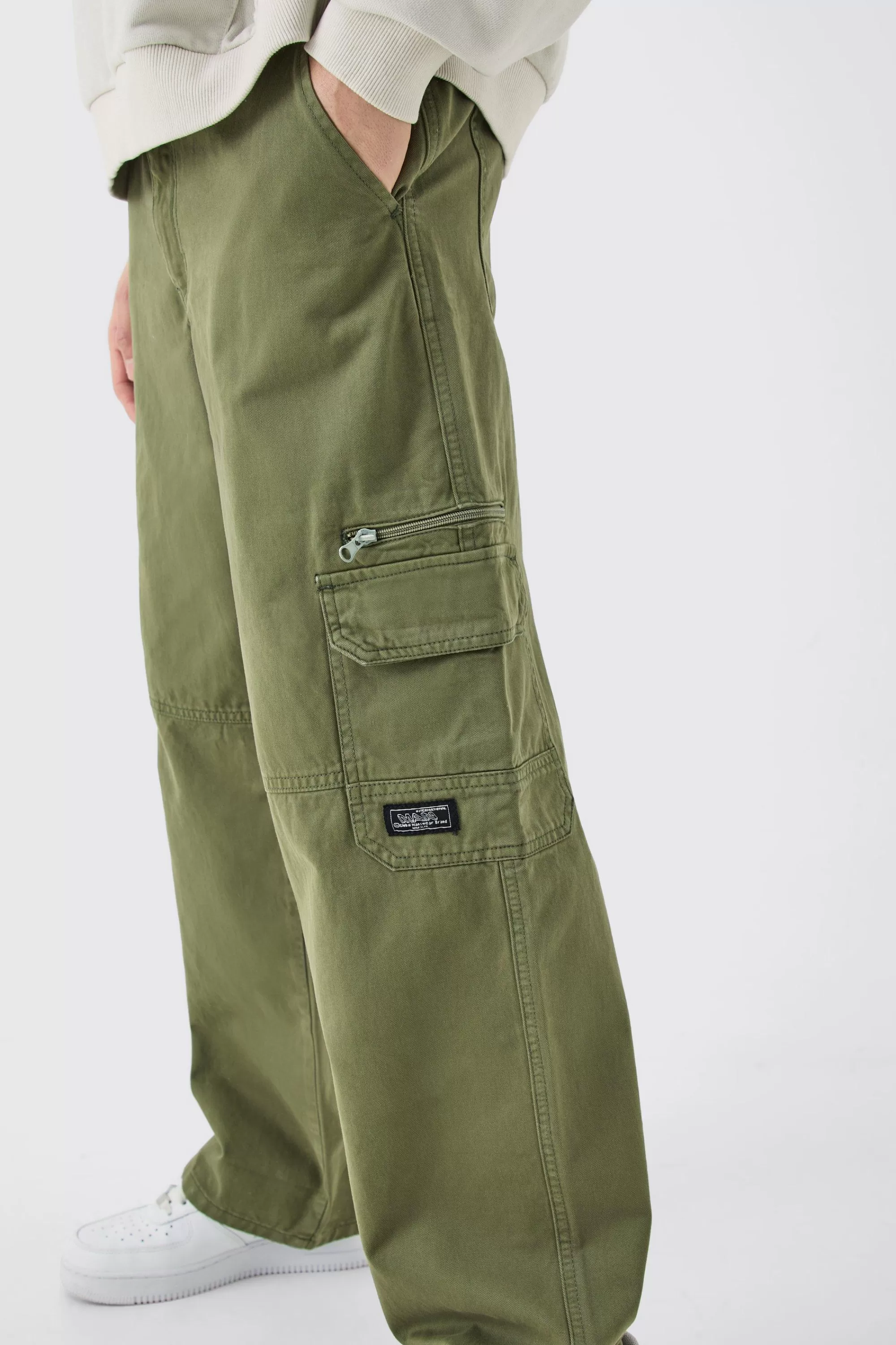 boohooMAN Fixed Waist Relaxed Cargo Trousers With Woven Tab | UK