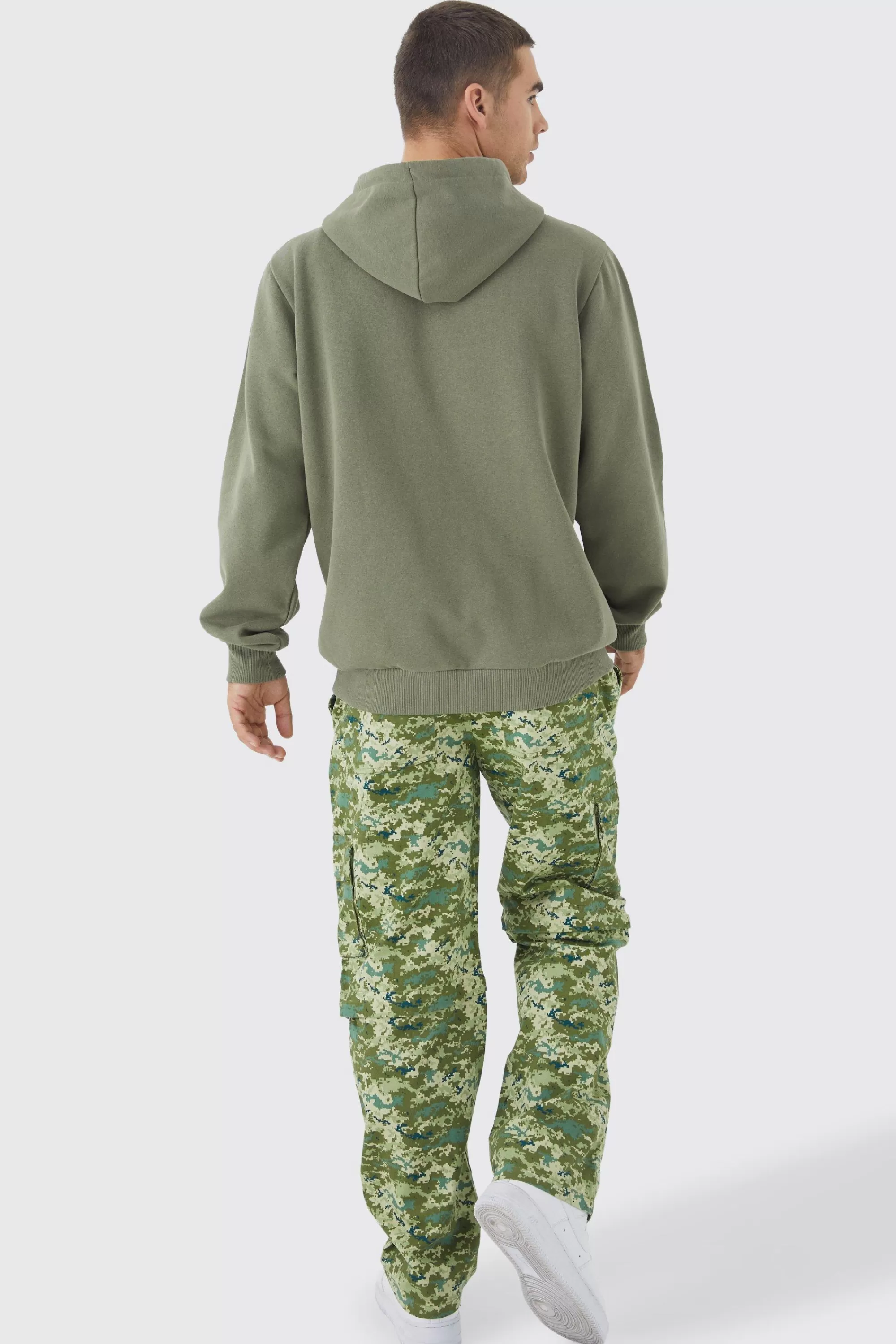 boohooMAN Fixed Waist Relaxed Zip Off Leg Camo Cargo Trouser | UK