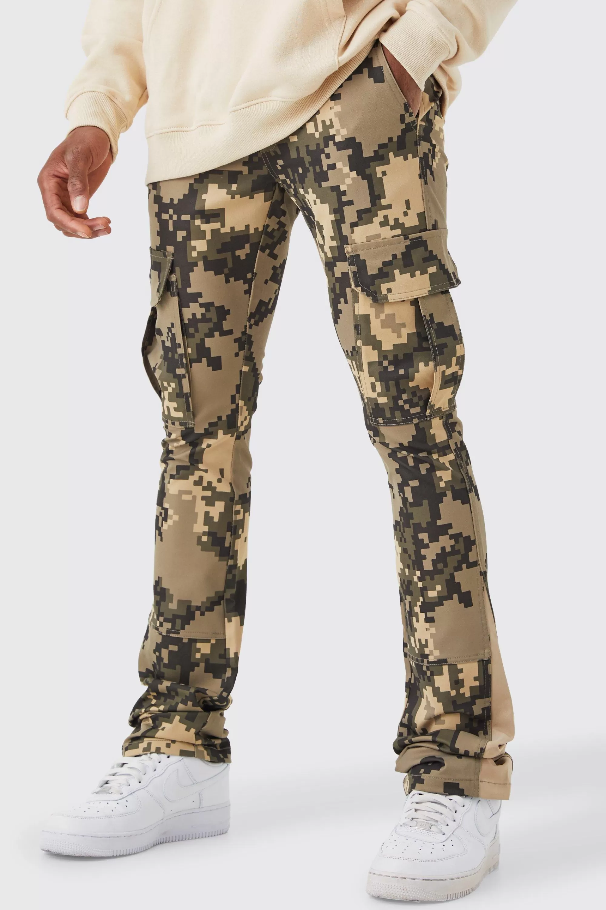 boohooMAN Fixed Waist Skinny Stacked Flare Pixel Cargo Trouser | UK