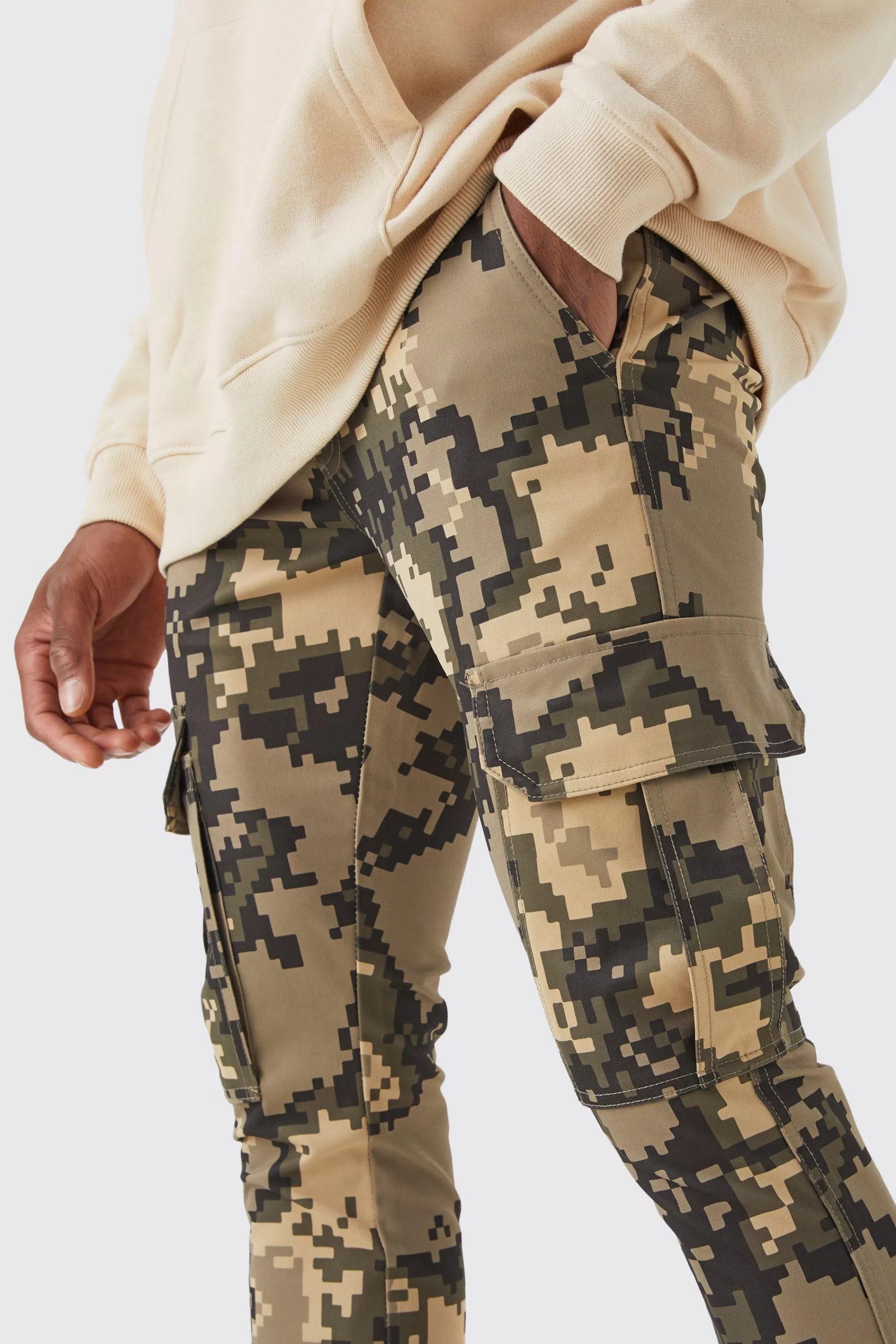 boohooMAN Fixed Waist Skinny Stacked Flare Pixel Cargo Trouser | UK