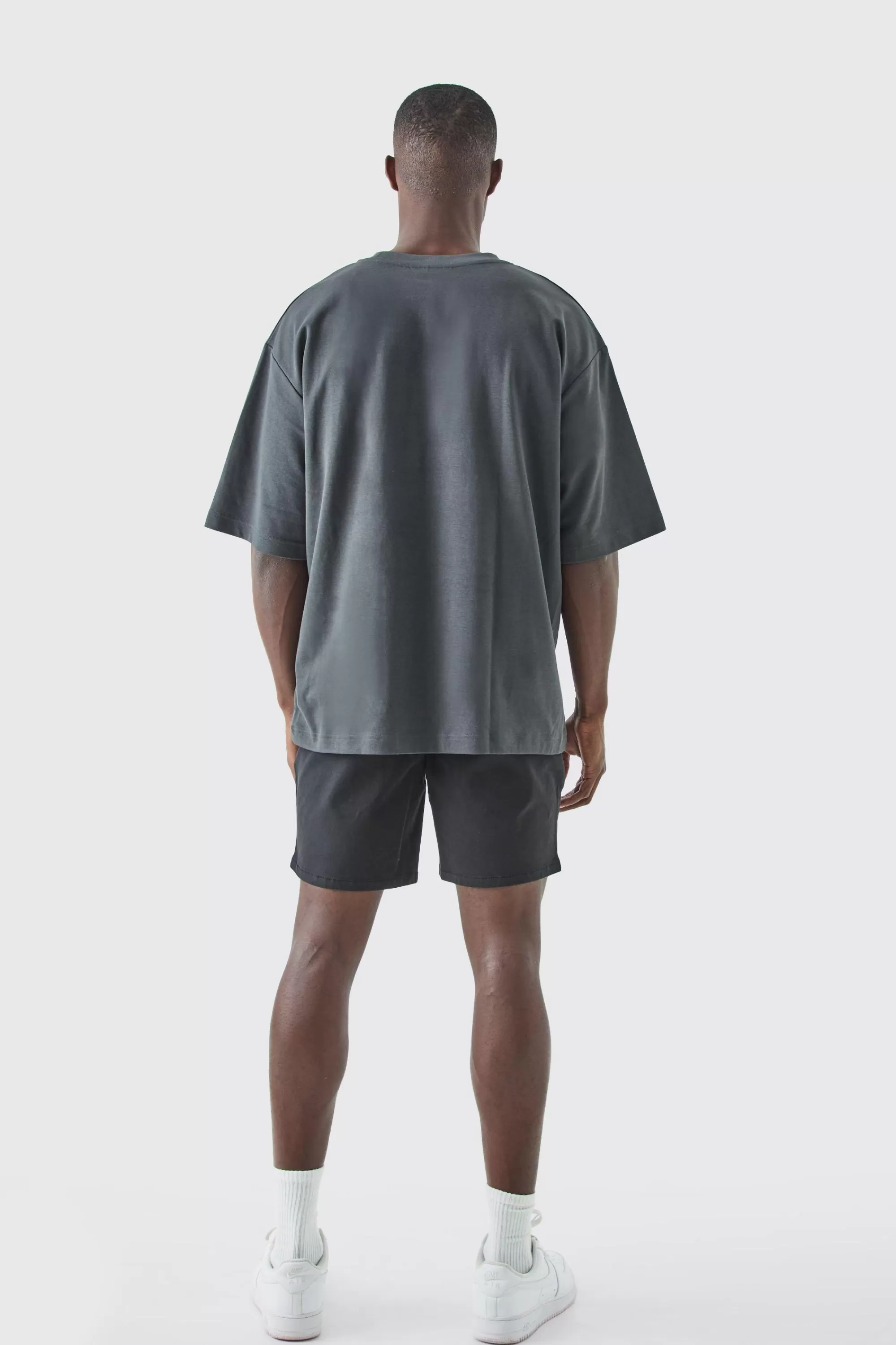 boohooMAN Fixed Waist Slim Fit Chino Shorts | UK