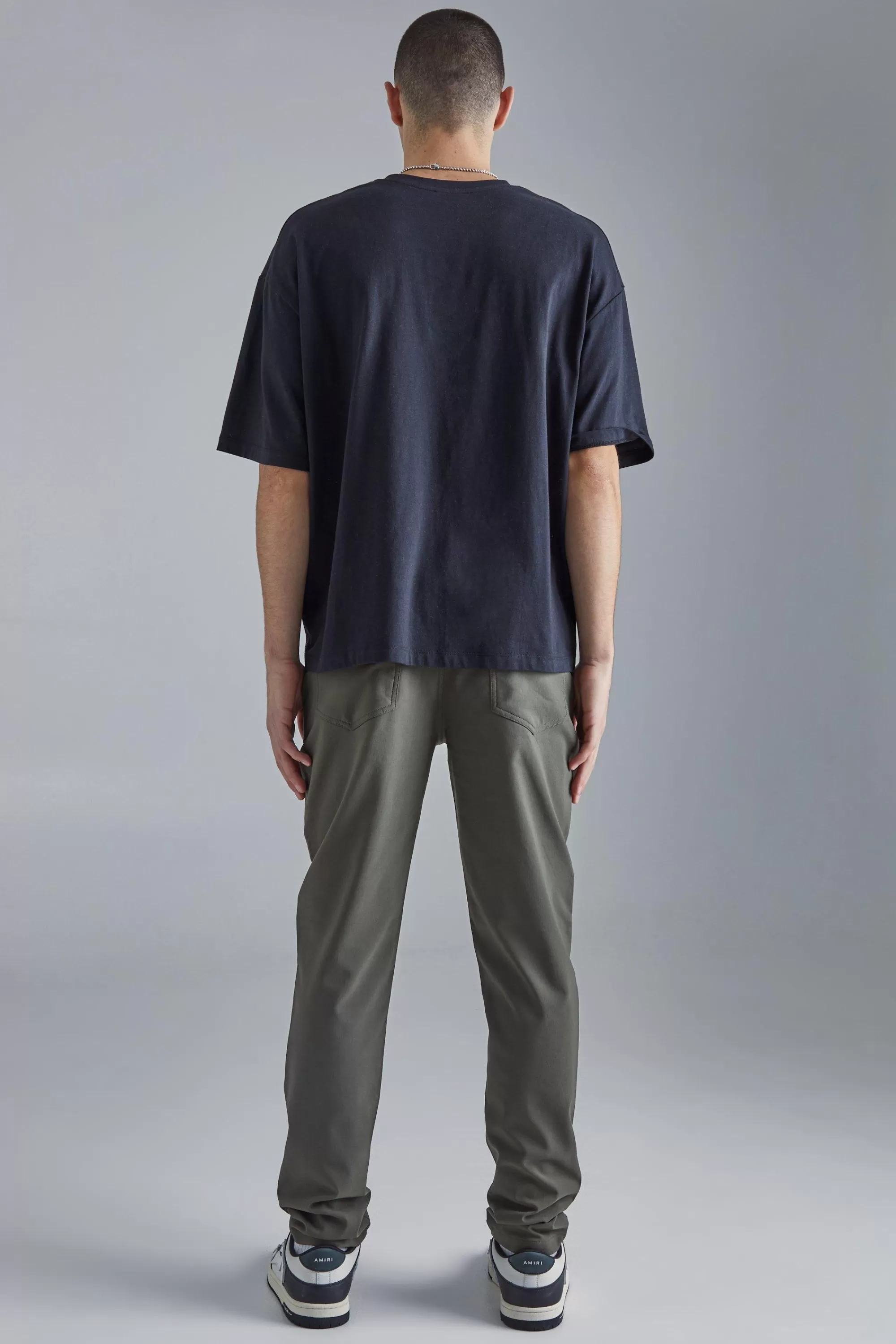 boohooMAN Fixed Waist Slim Fit Technical Golf Stretch Trouser | UK