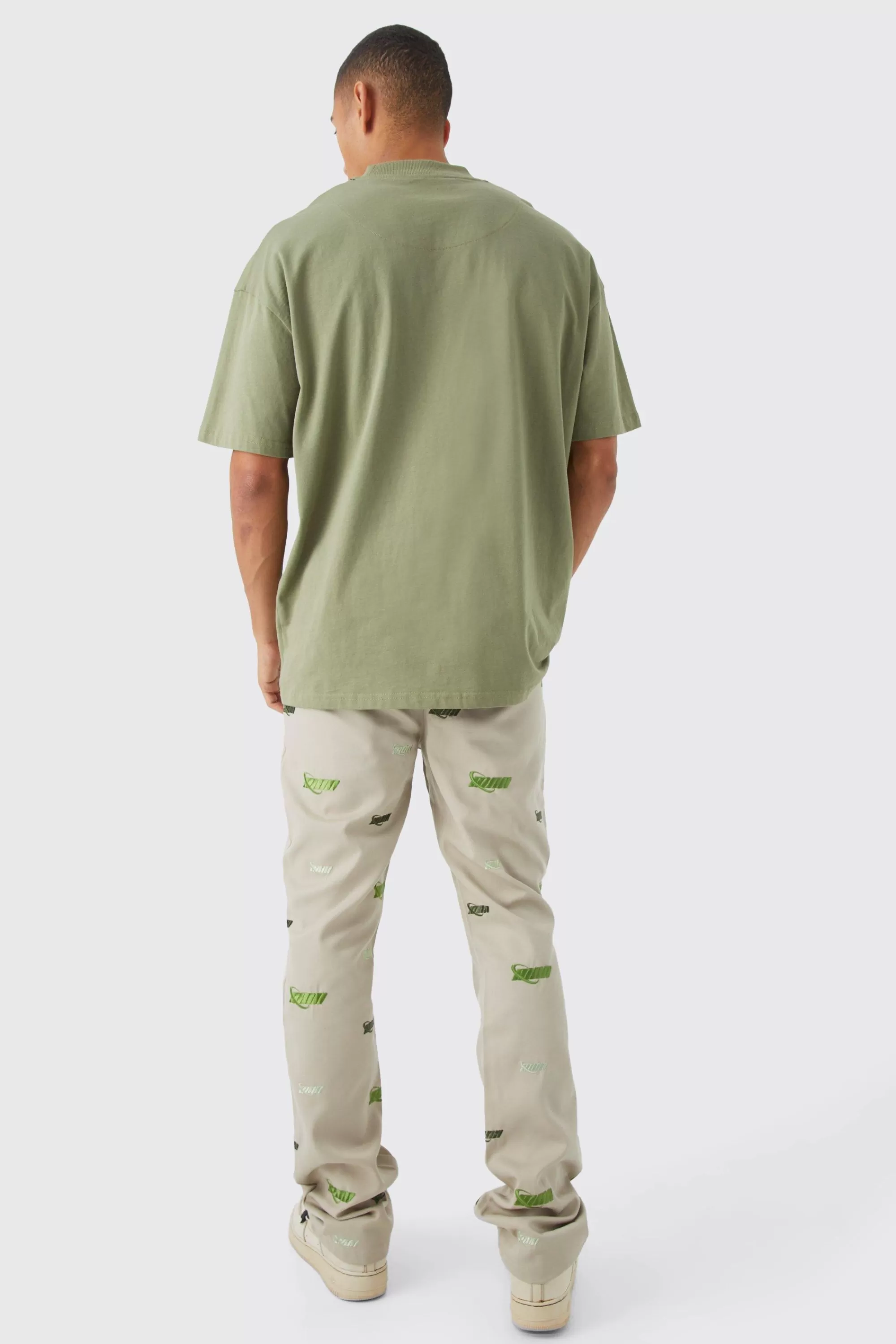 boohooMAN Fixed Waist Slim Flare Embroidered Trouser | UK