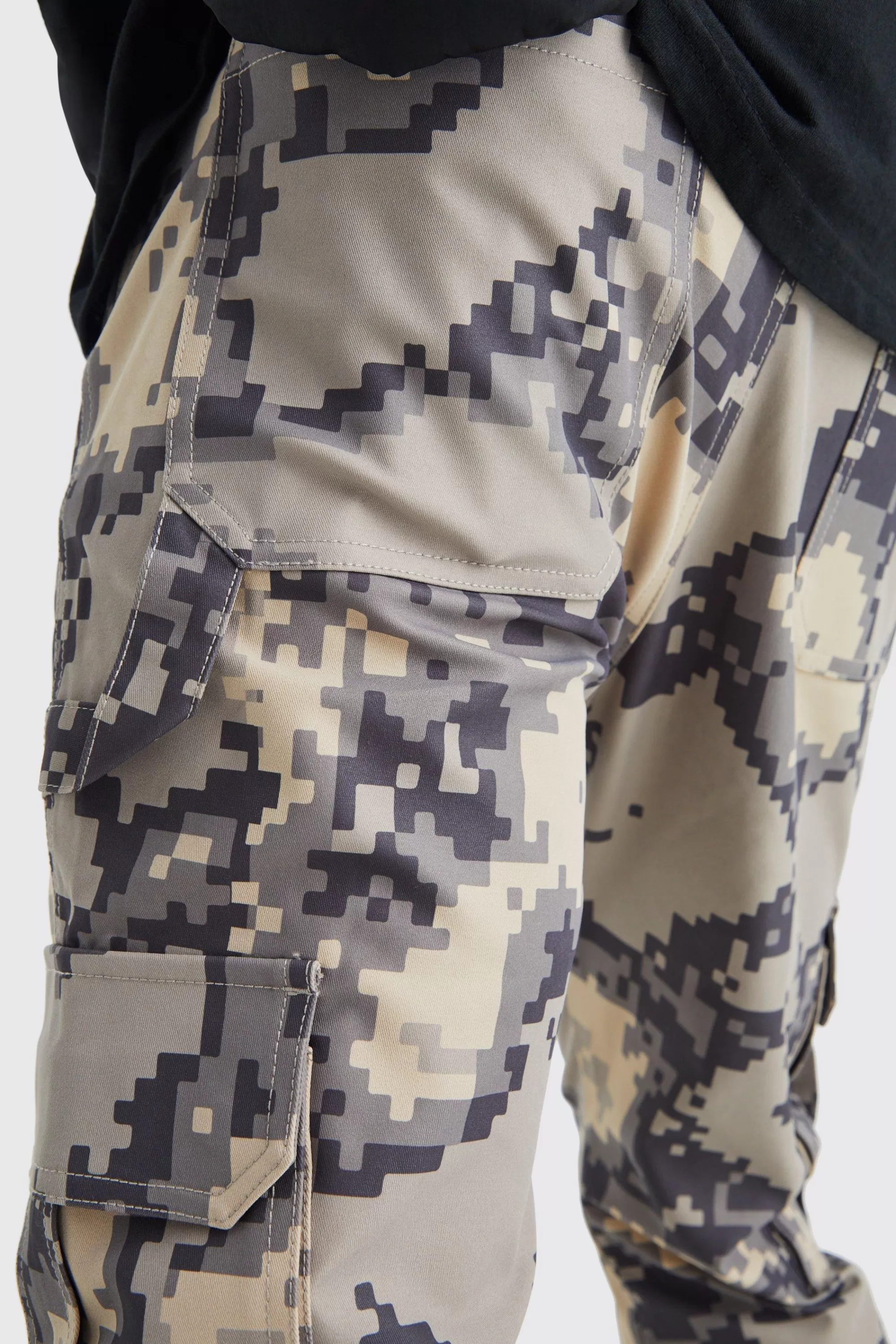 boohooMAN Fixed Waist Slim Flare Gusset Pixel Camo Cargo Trouser | UK