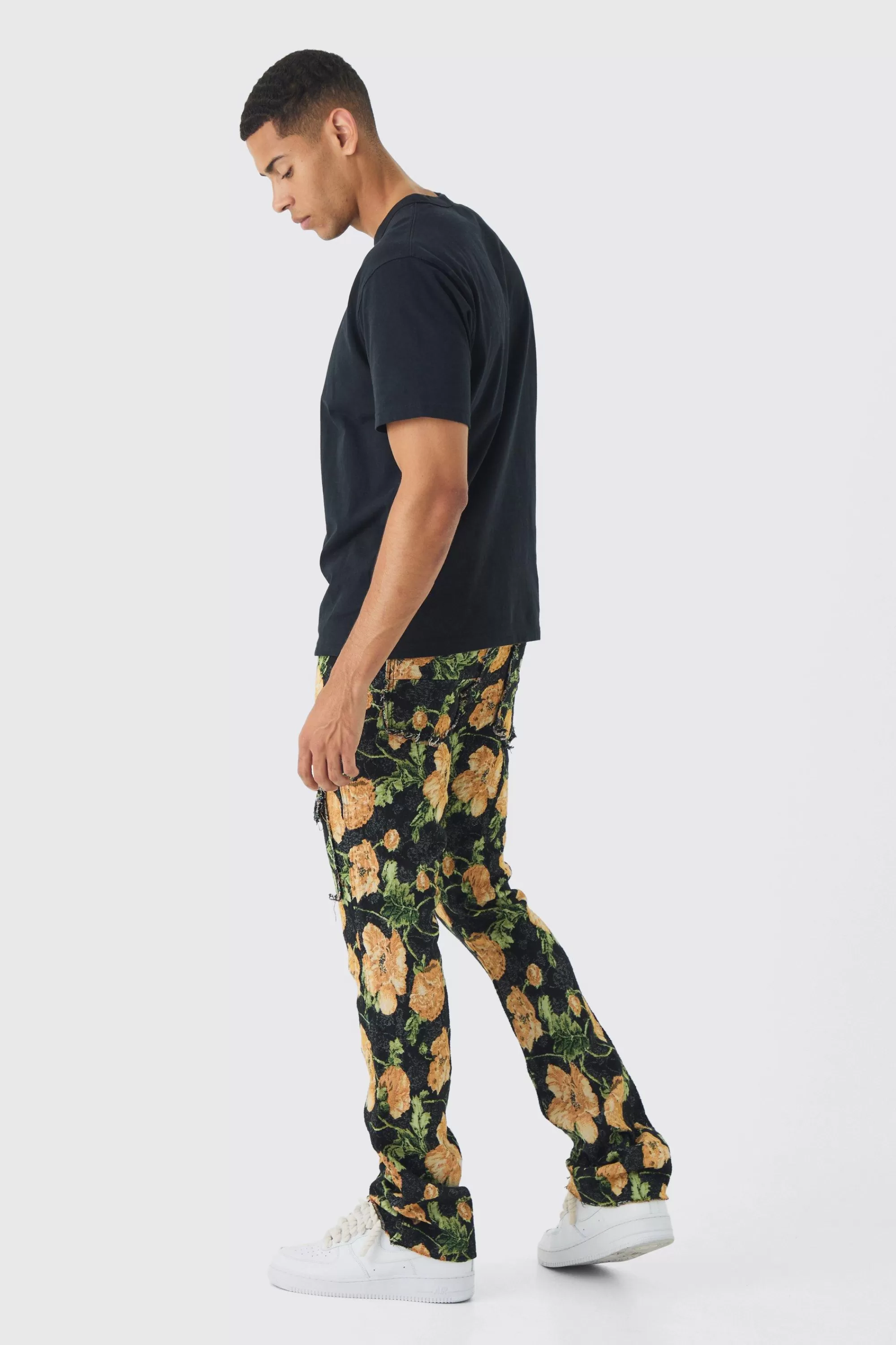 boohooMAN Fixed Waist Slim Flare Stacked Floral Tapestry Cargo Trouser | UK