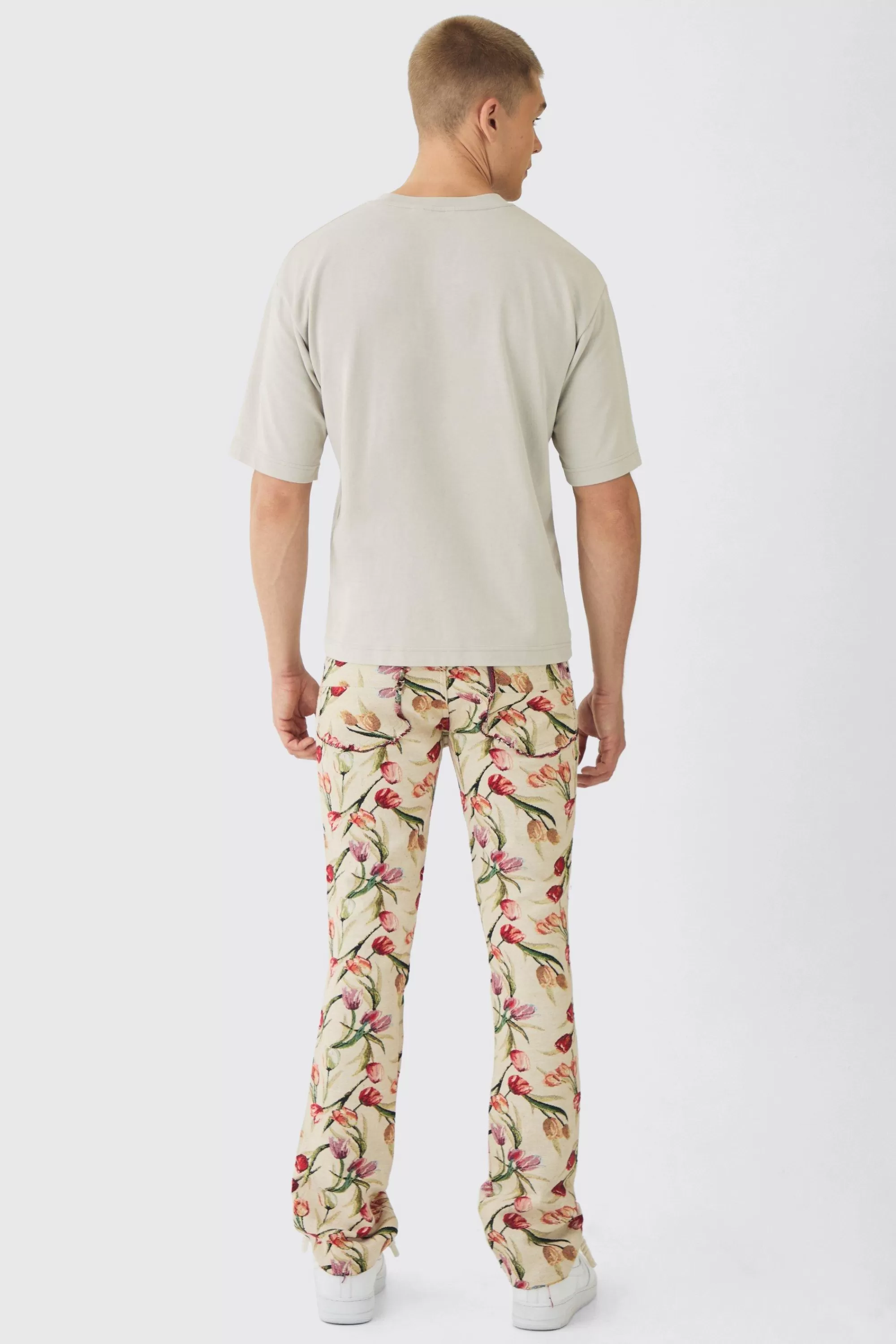 boohooMAN Fixed Waist Slim Flare Stacked Floral Tapestry Cargo Trouser | UK