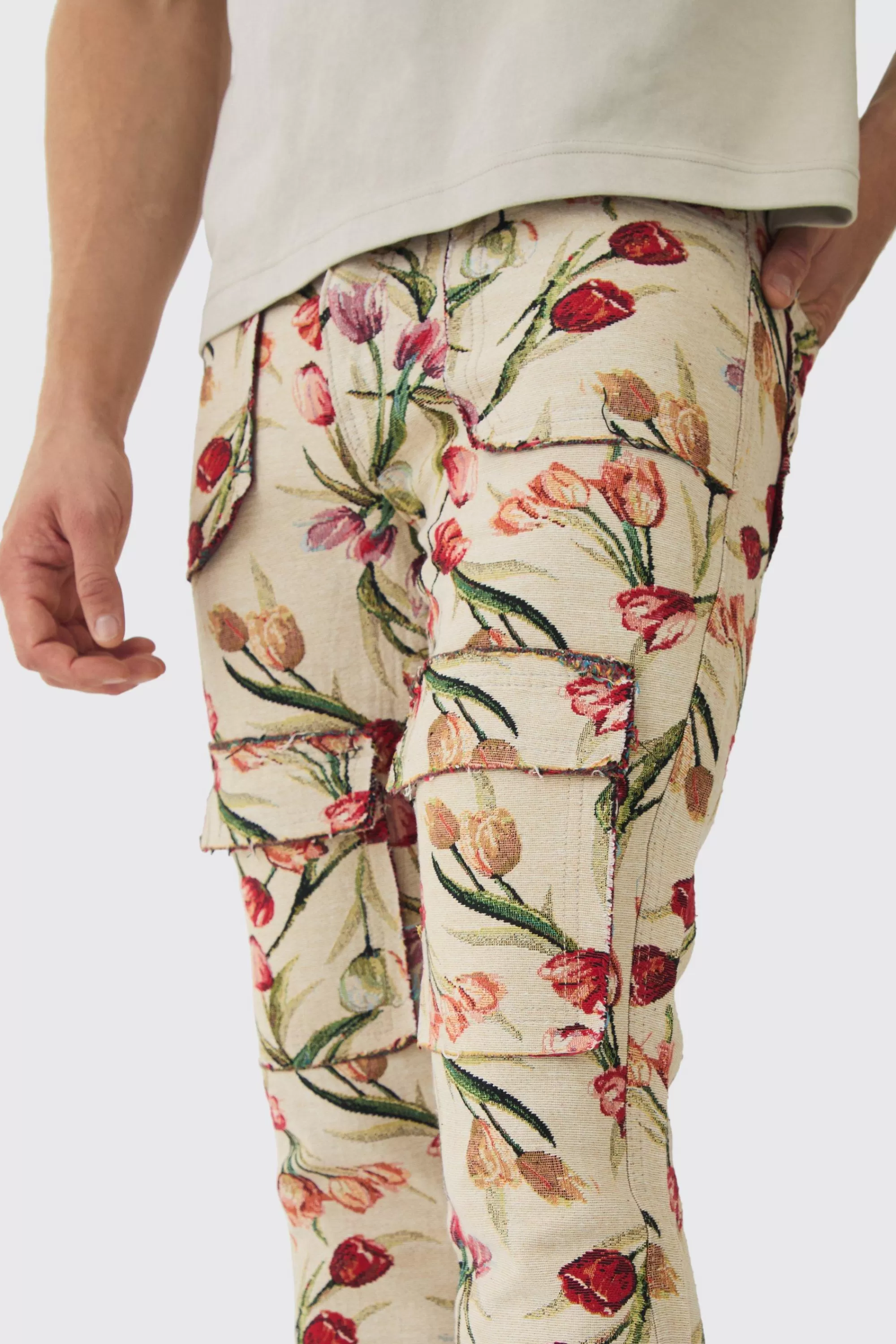 boohooMAN Fixed Waist Slim Flare Stacked Floral Tapestry Cargo Trouser | UK