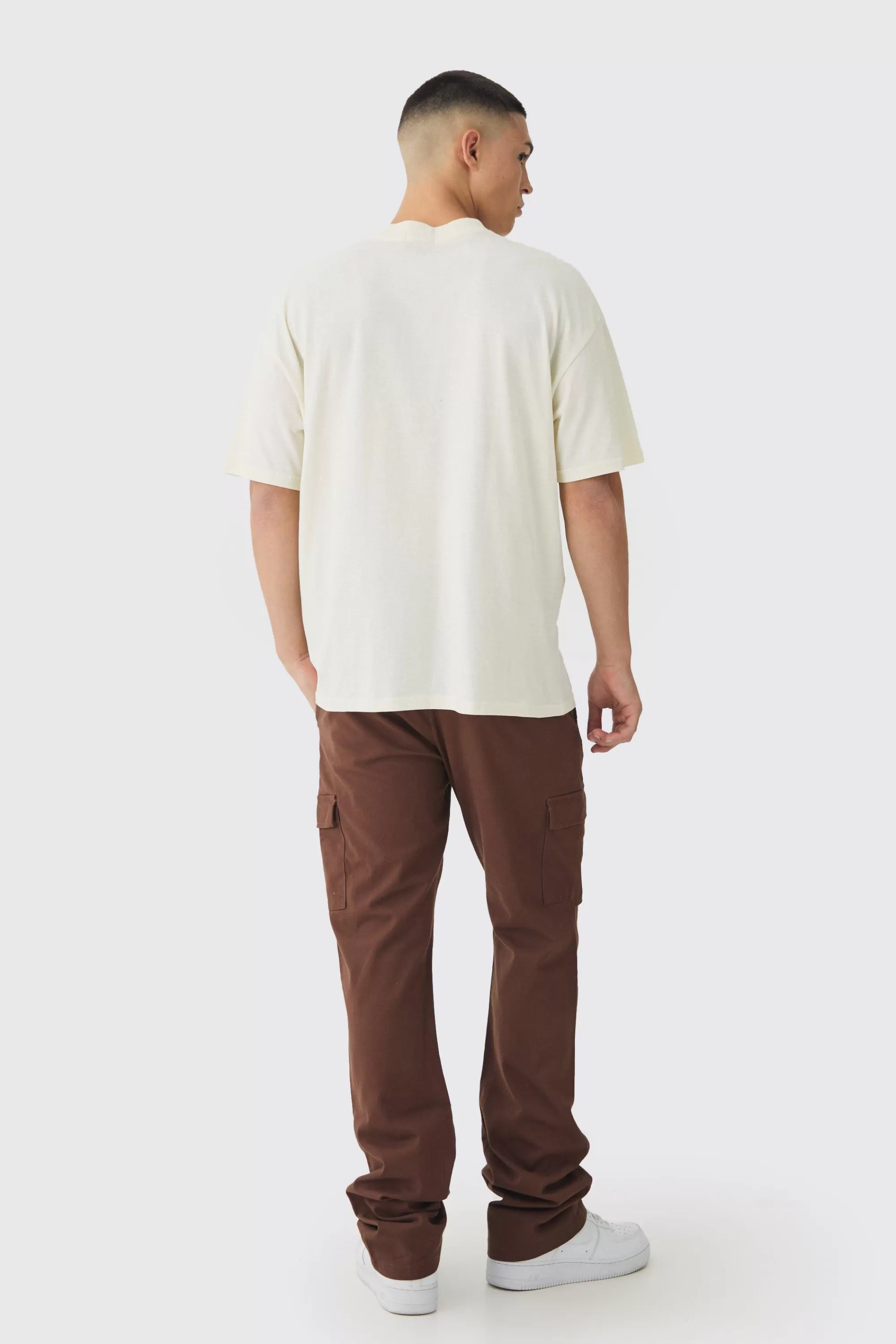 boohooMAN Fixed Waist Slim Flare Stacked Twill Cargo Trousers | UK