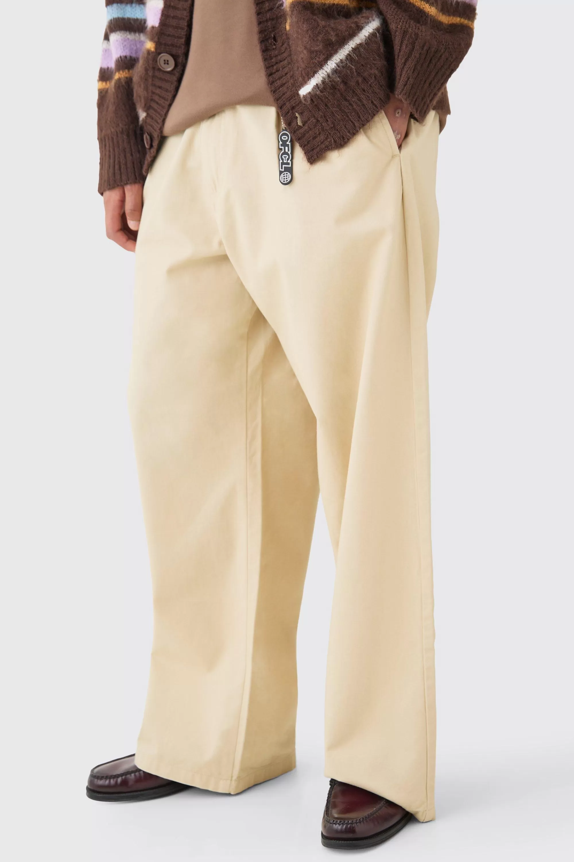 boohooMAN Fixed Waist Super Wide Leg Chino With Charm | UK