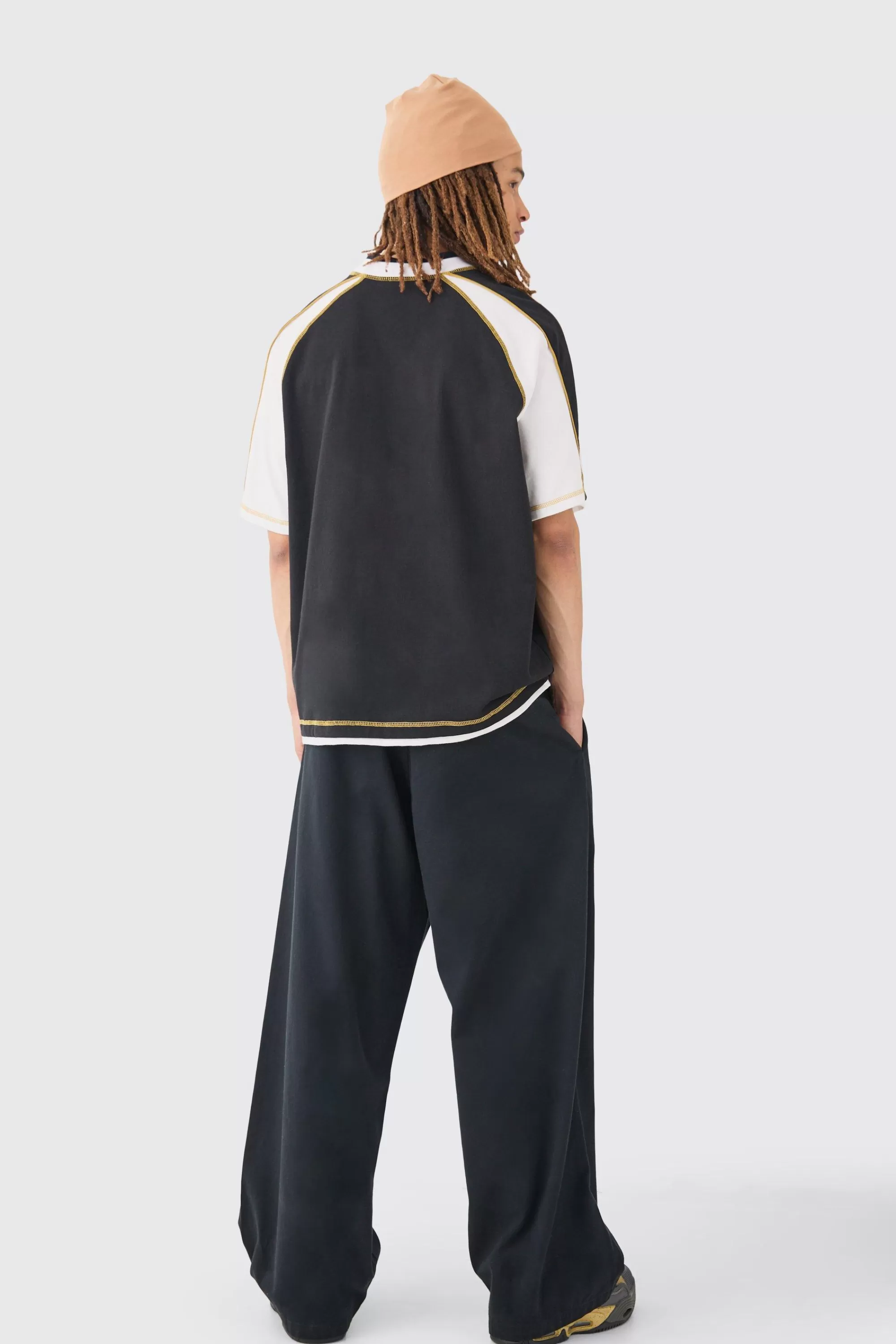 boohooMAN Fixed Waist Super Wide Leg Chino With Charm | UK
