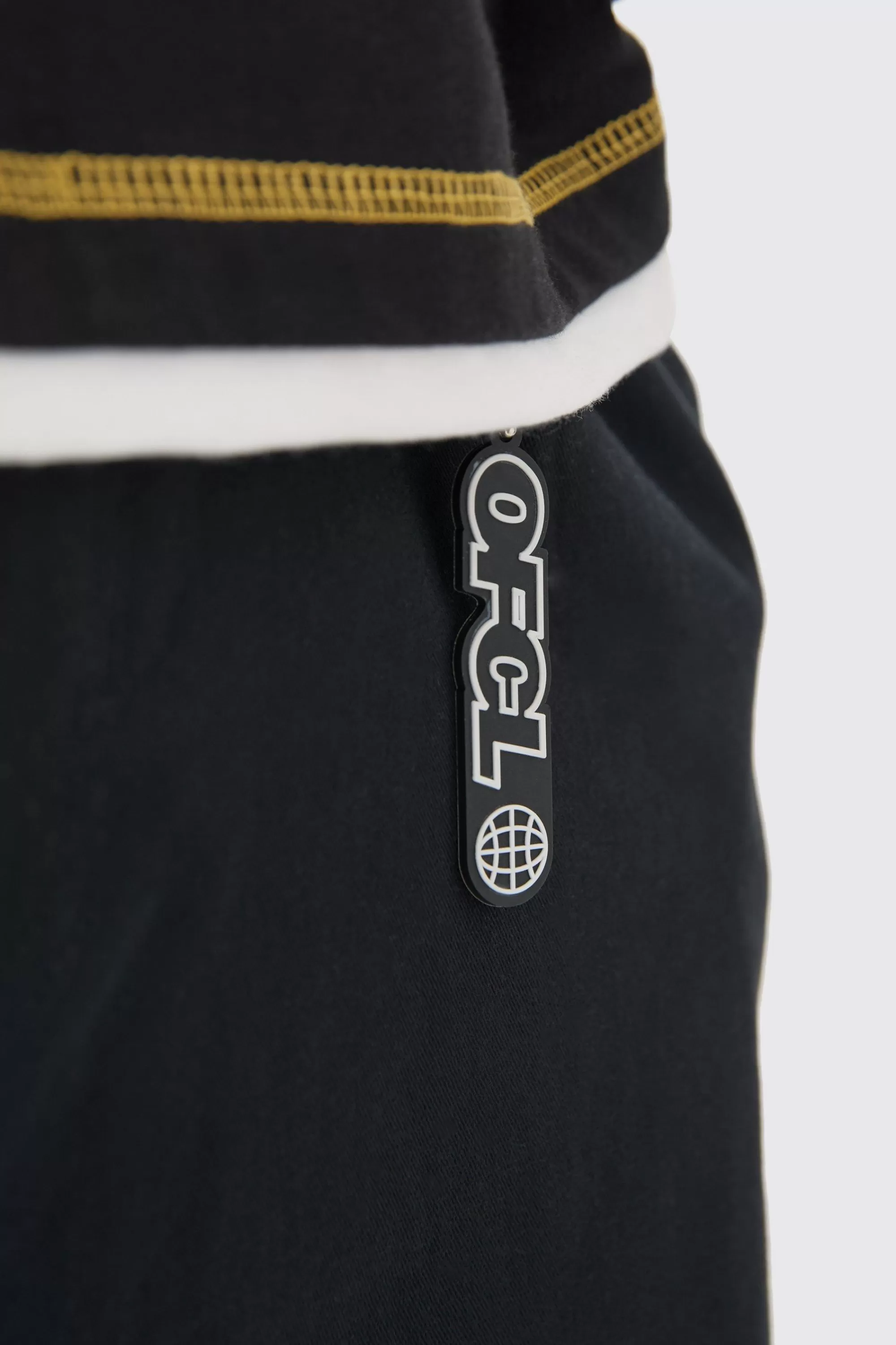 boohooMAN Fixed Waist Super Wide Leg Chino With Charm | UK