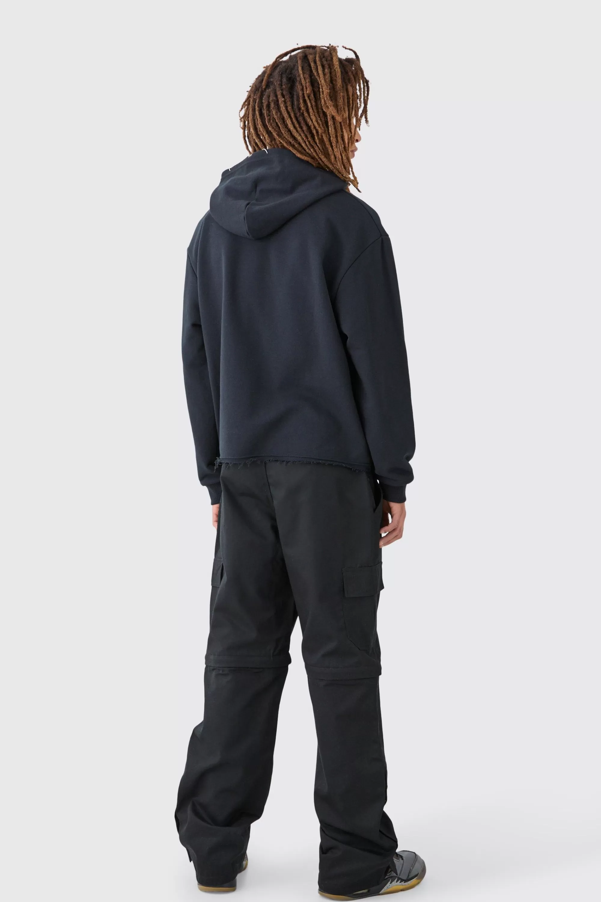 boohooMAN Fixed Waist Twill Popper Hem Zip Off Relaxed Cargo Trousers | UK