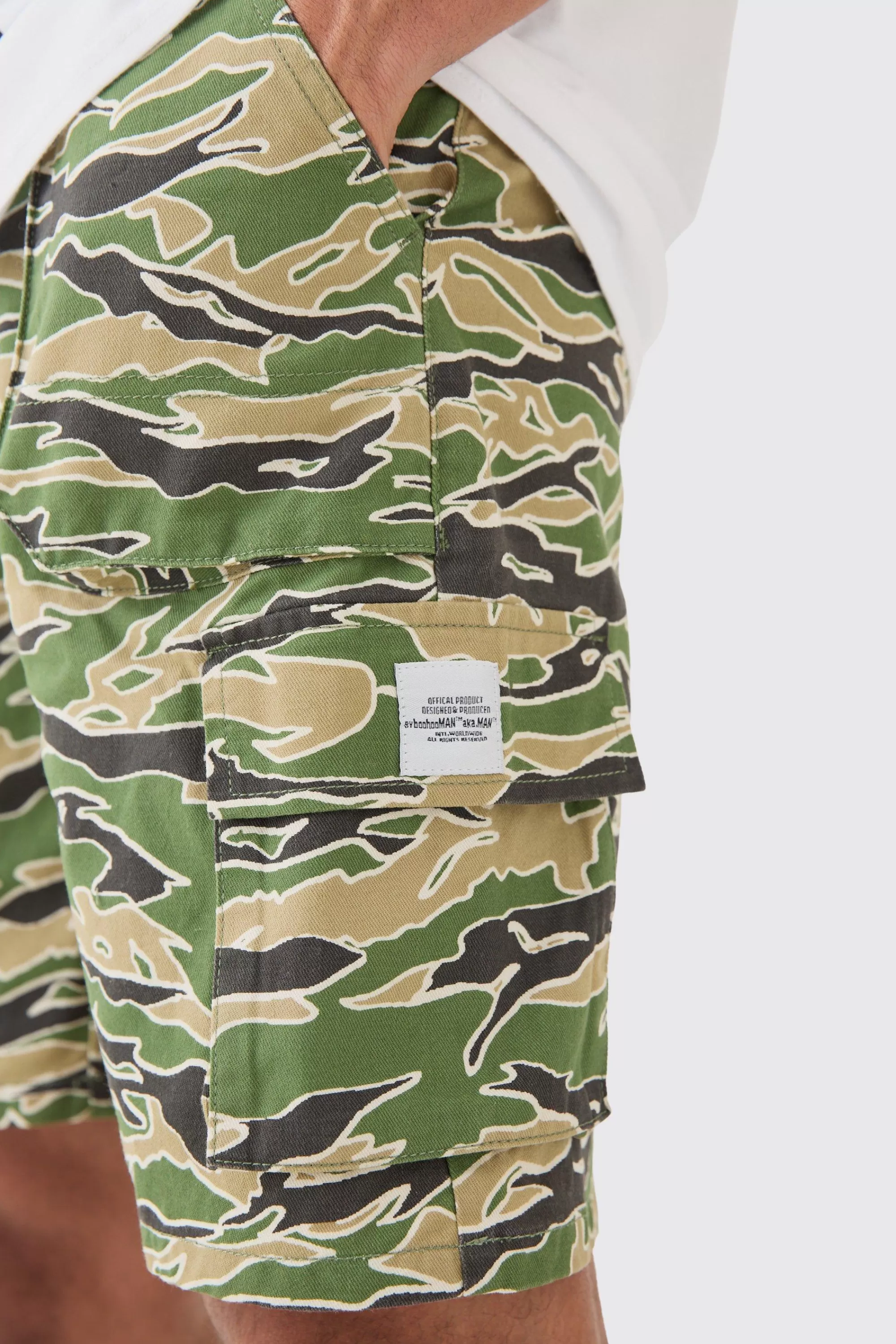 boohooMAN Fixed Waist Woven Tab Camo Relaxed Cargo Shorts | UK