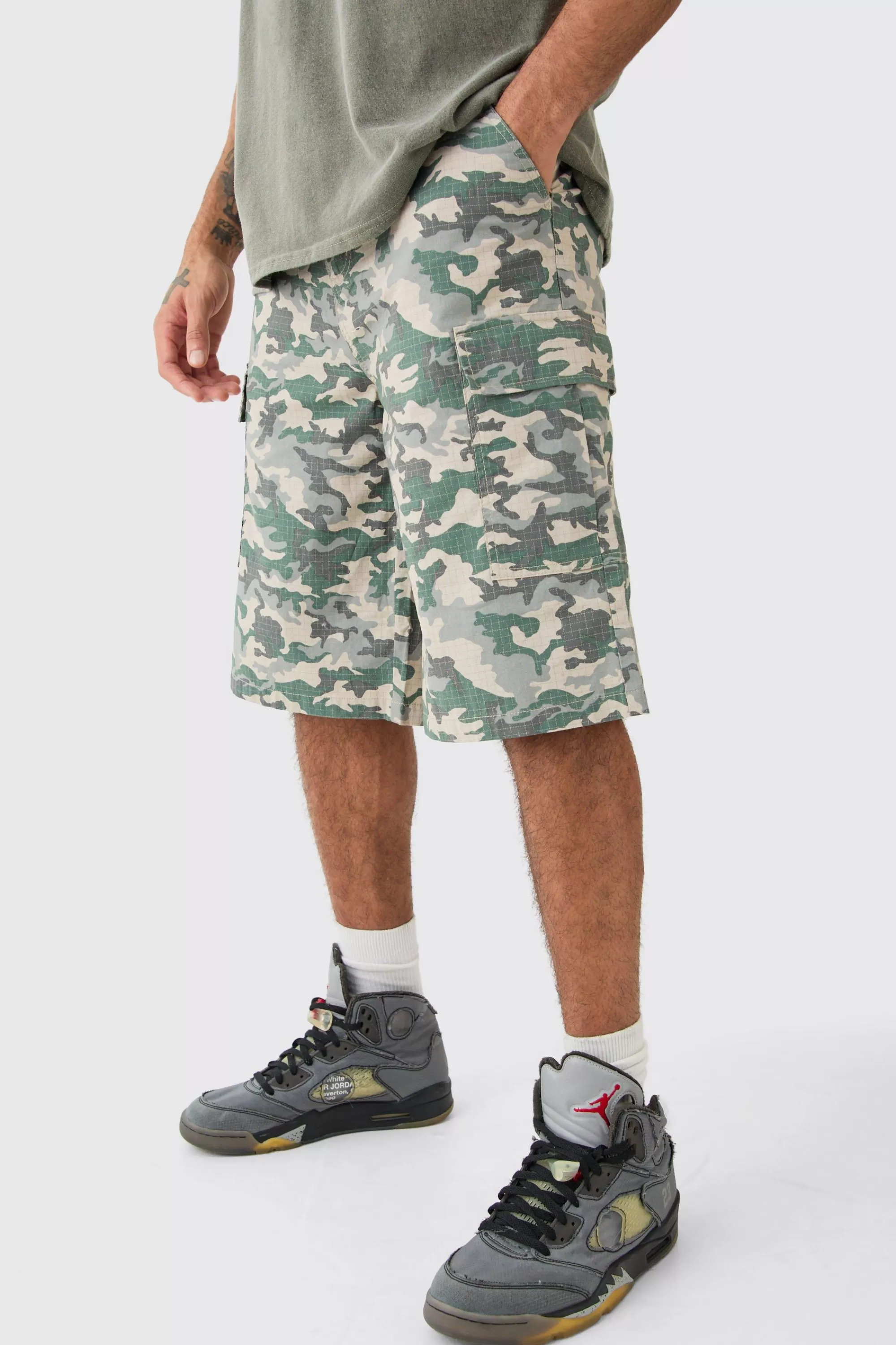 boohooMAN Fixed Waist Woven Tab Ripstop Camo Jorts | UK