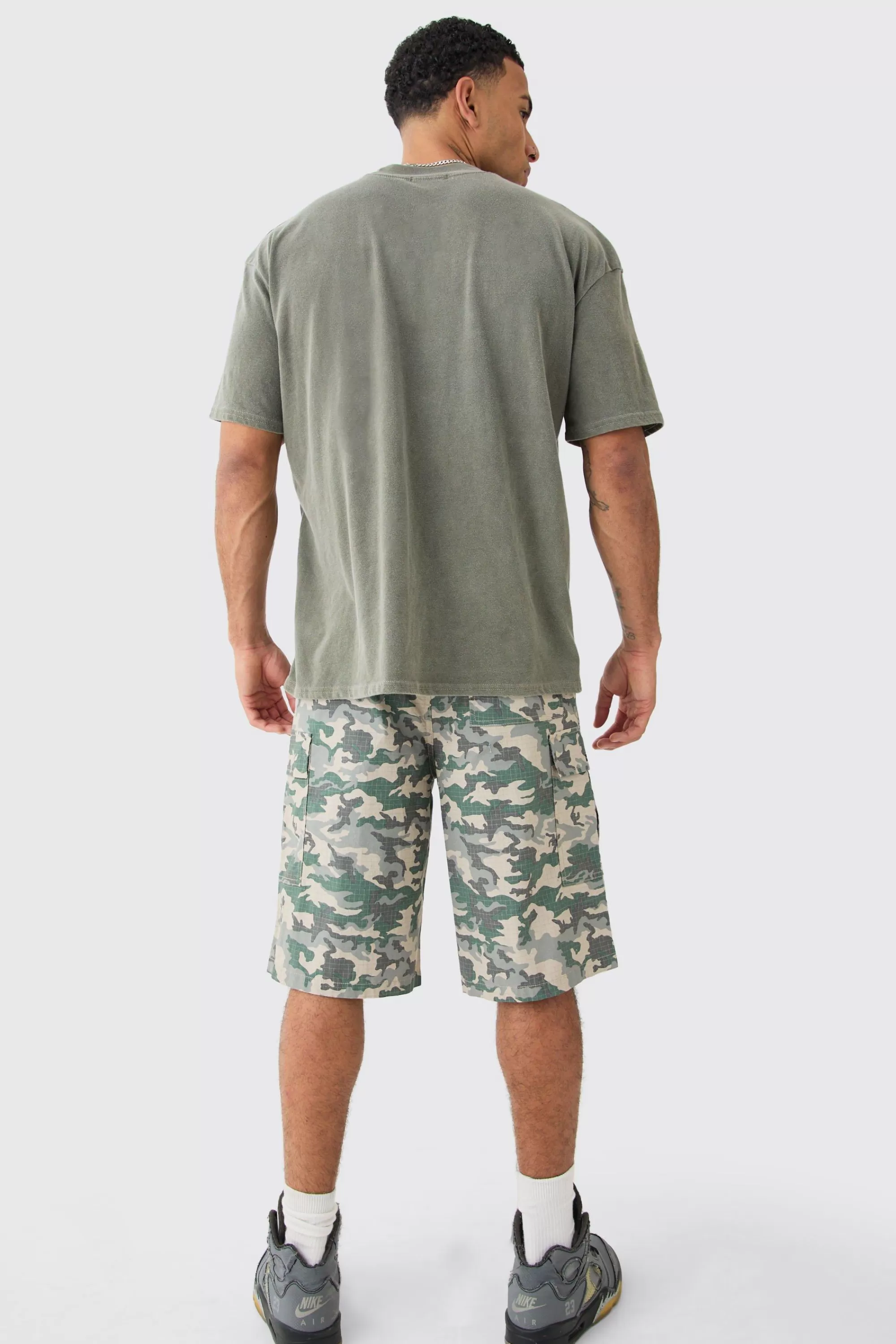boohooMAN Fixed Waist Woven Tab Ripstop Camo Jorts | UK