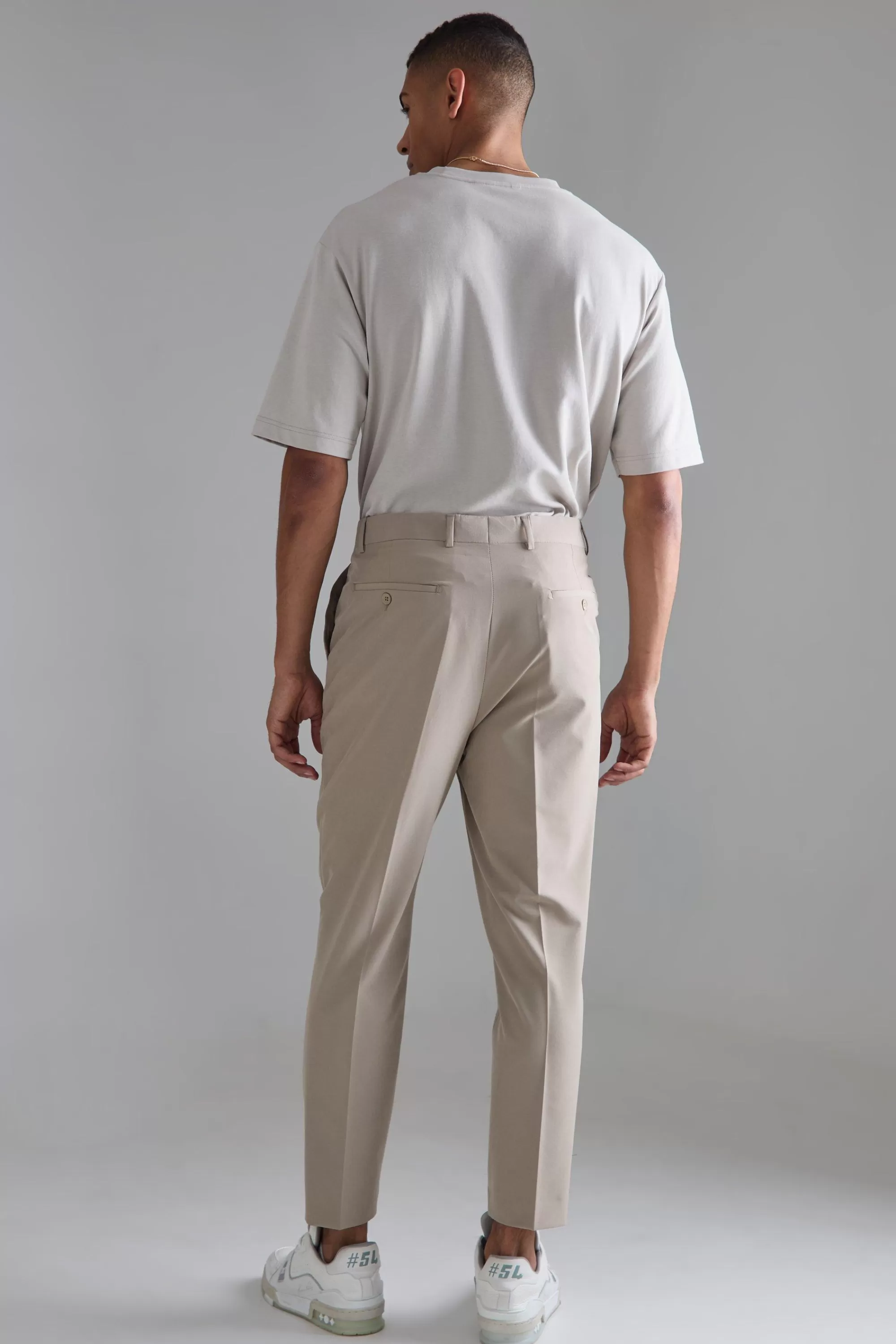 boohooMAN High Rise 4 Way Stretch Tapered Trousers | UK