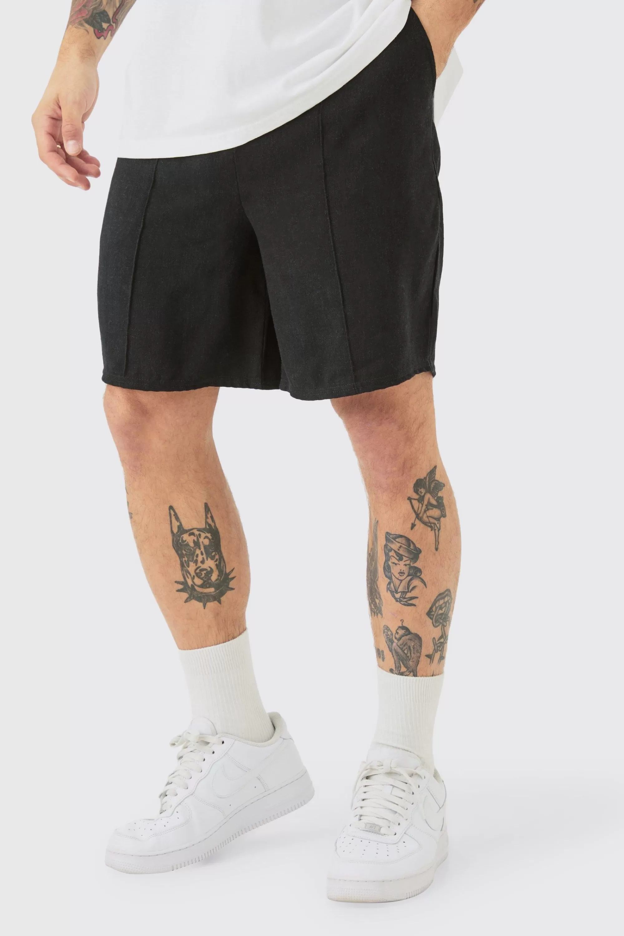 boohooMAN Linen Look Pin Tuck Elasticated Waist Relaxed Shorts | UK