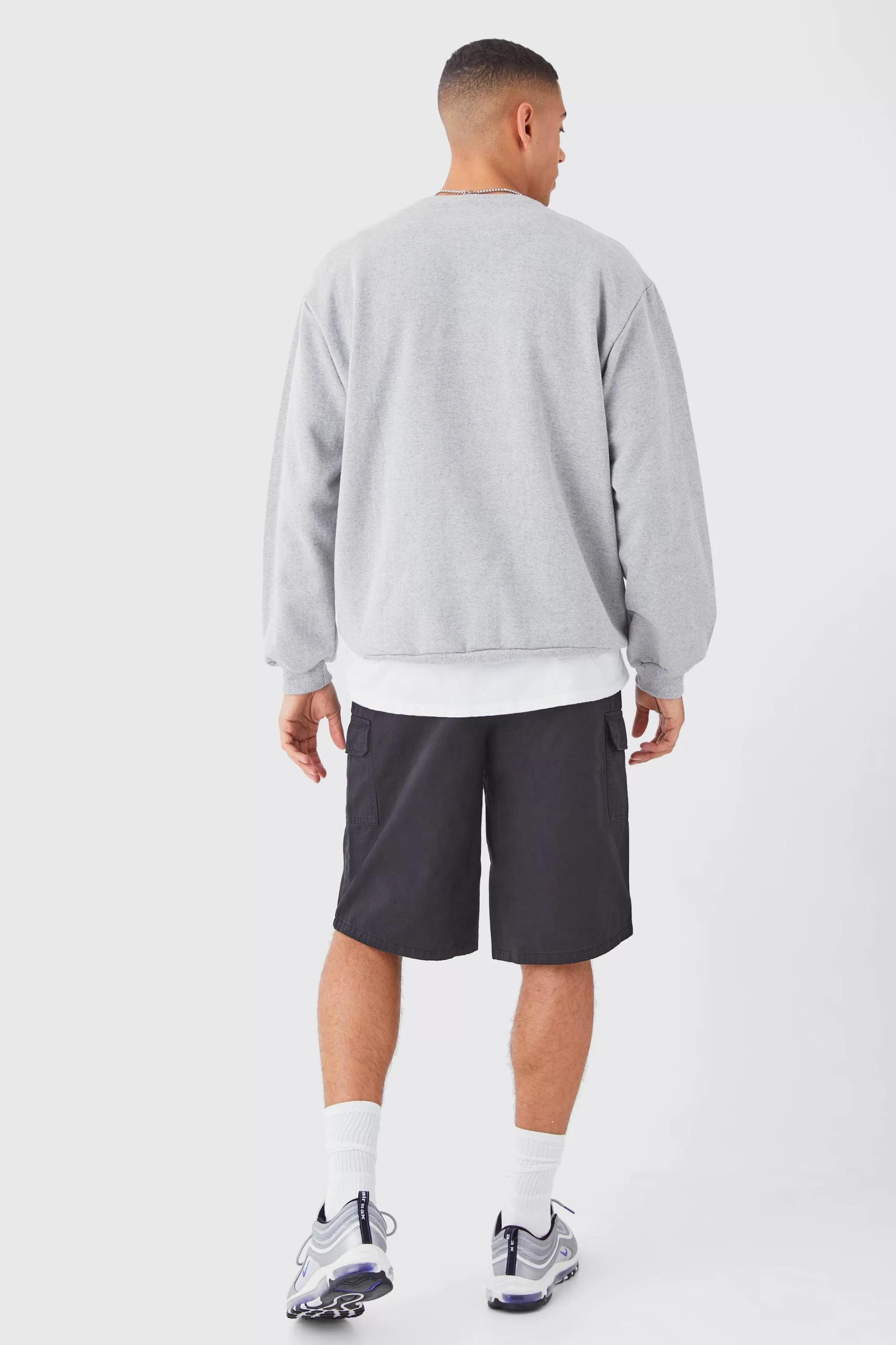 boohooMAN Longer Length Relaxed Fit Elasticated Waist Cargo Shorts | UK