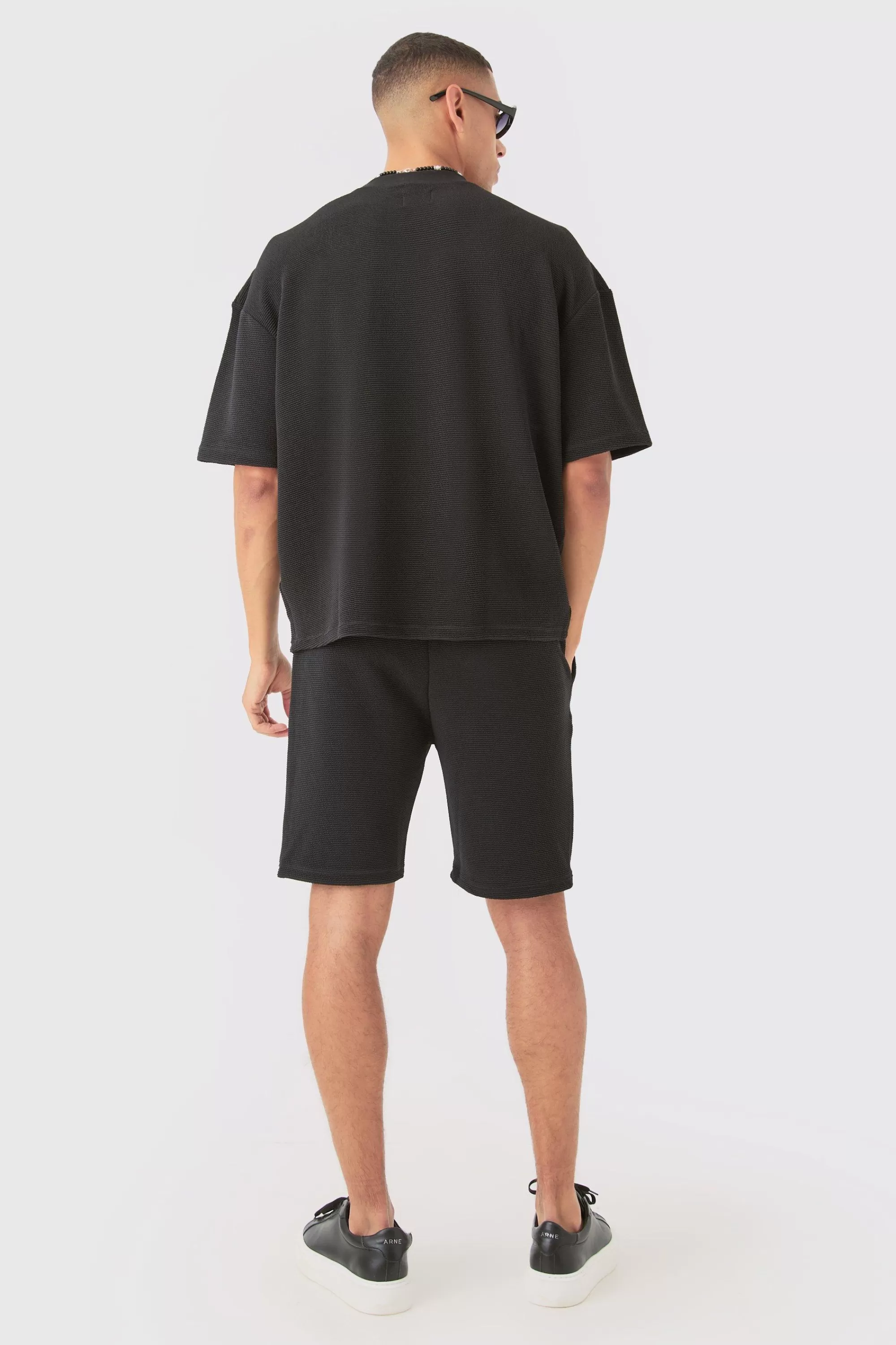 boohooMAN Loose Fit Mid Length Textured Shorts | UK