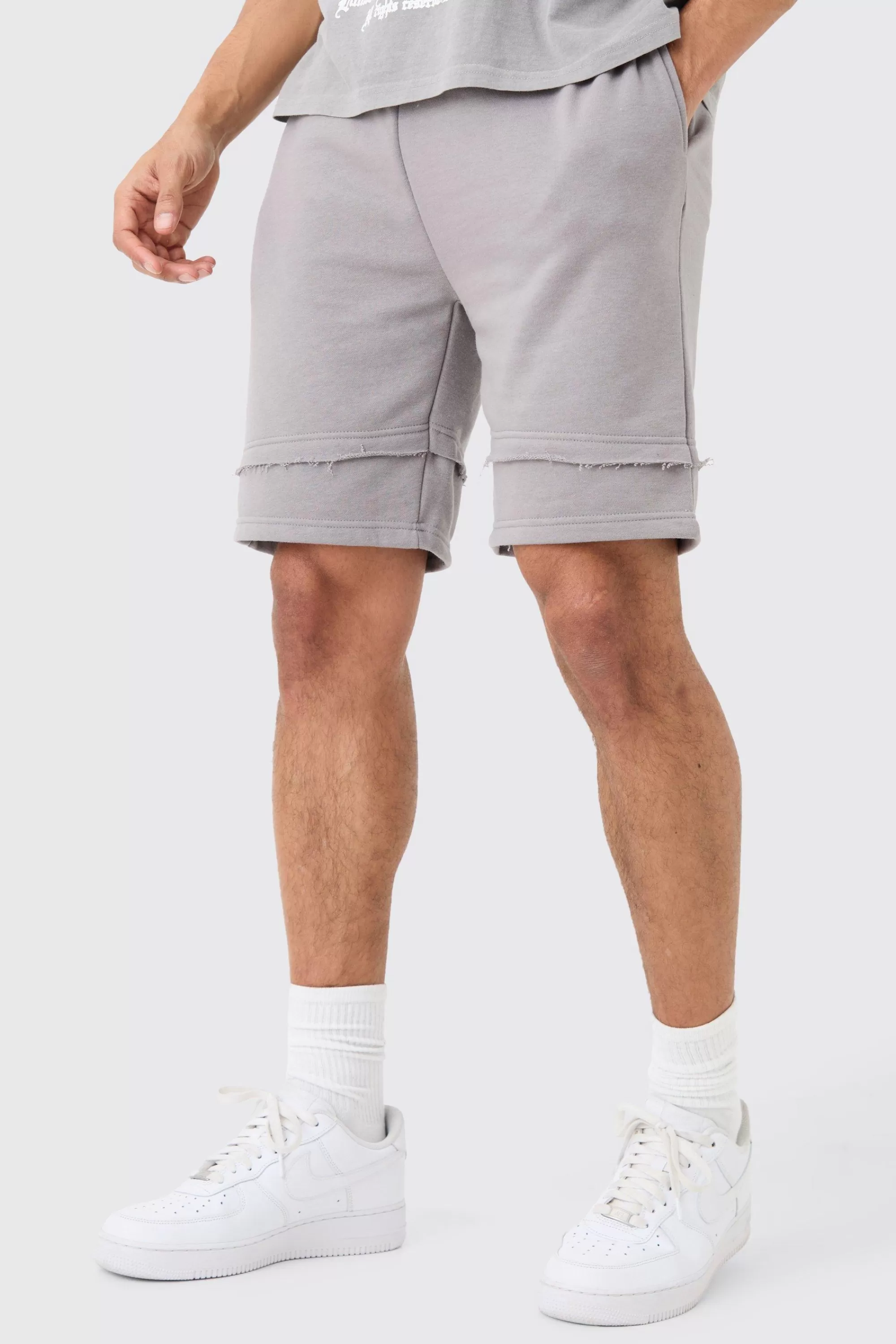 boohooMAN Loose Fit Raw Layer Short | UK