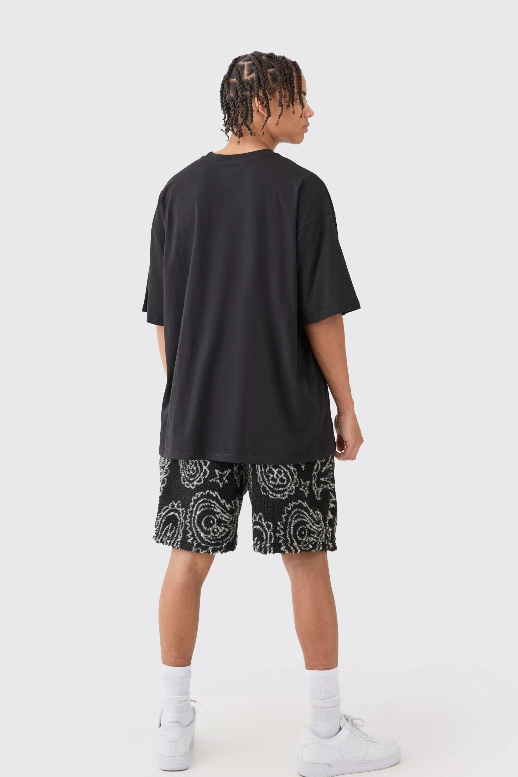 boohooMAN Loose Mid Length Bandana Borg Shorts | UK