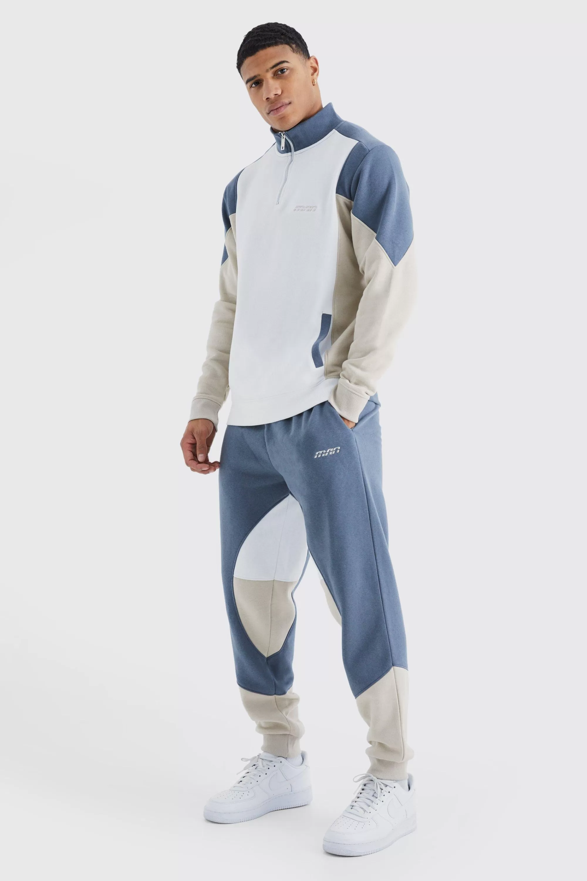 boohooMAN Man 1/4 Zip Funnel Neck Colour Block Tracksuit | UK