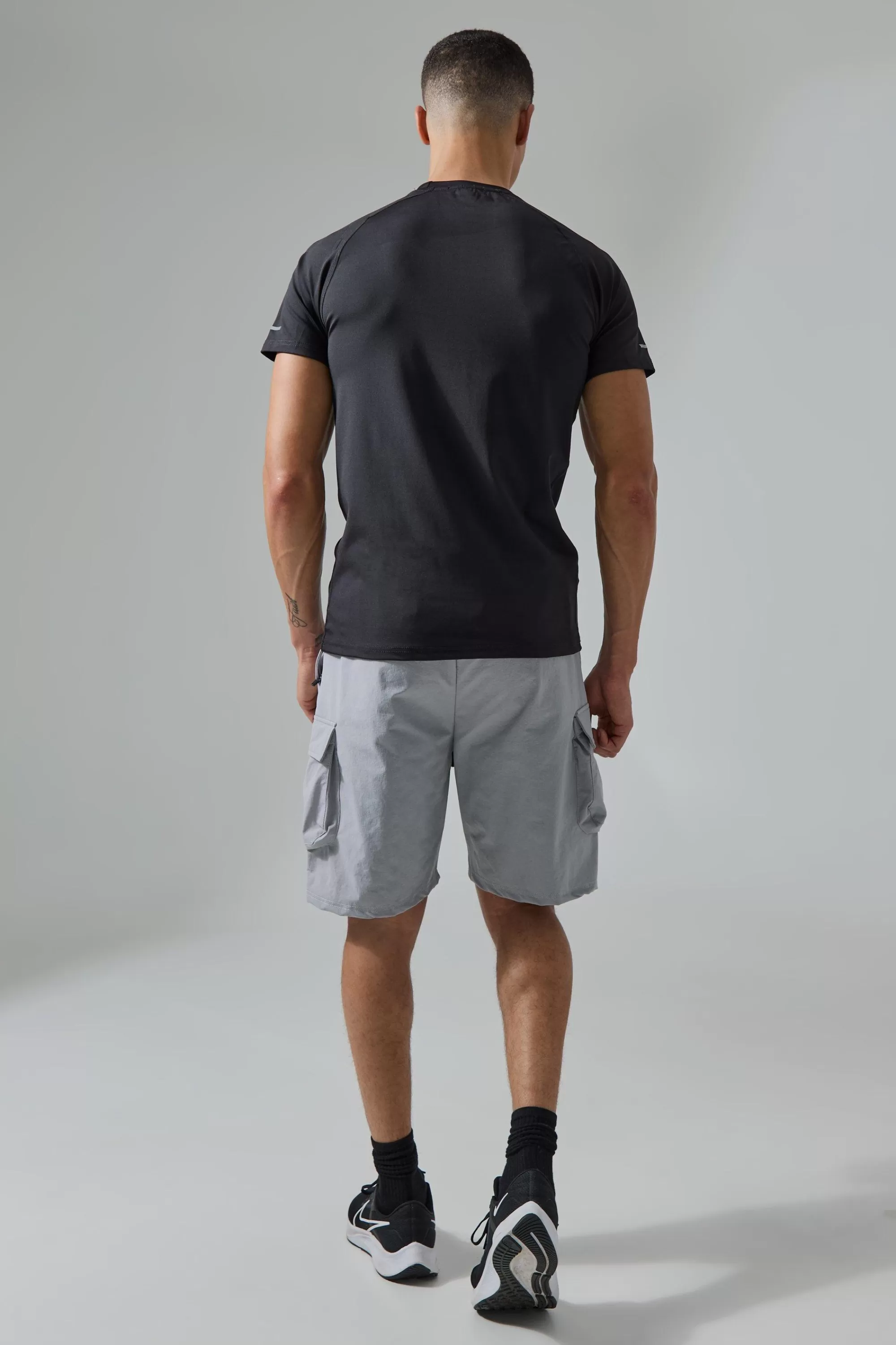 boohooMAN Man Active 5inch Oversized Reflective Cargo Short | UK
