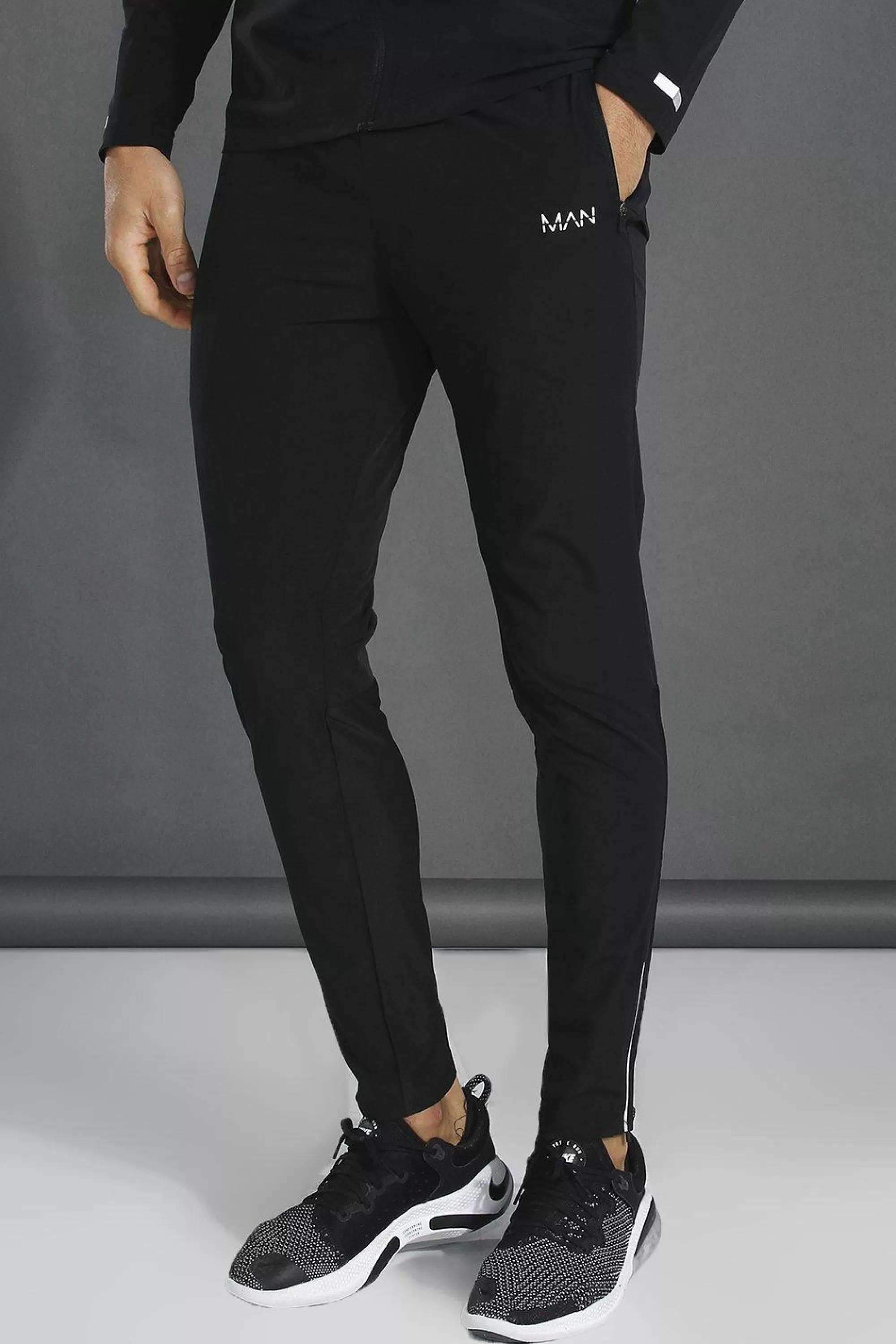 boohooMAN Man Active Gym Lightweight Plain Tapered Track Pant | UK
