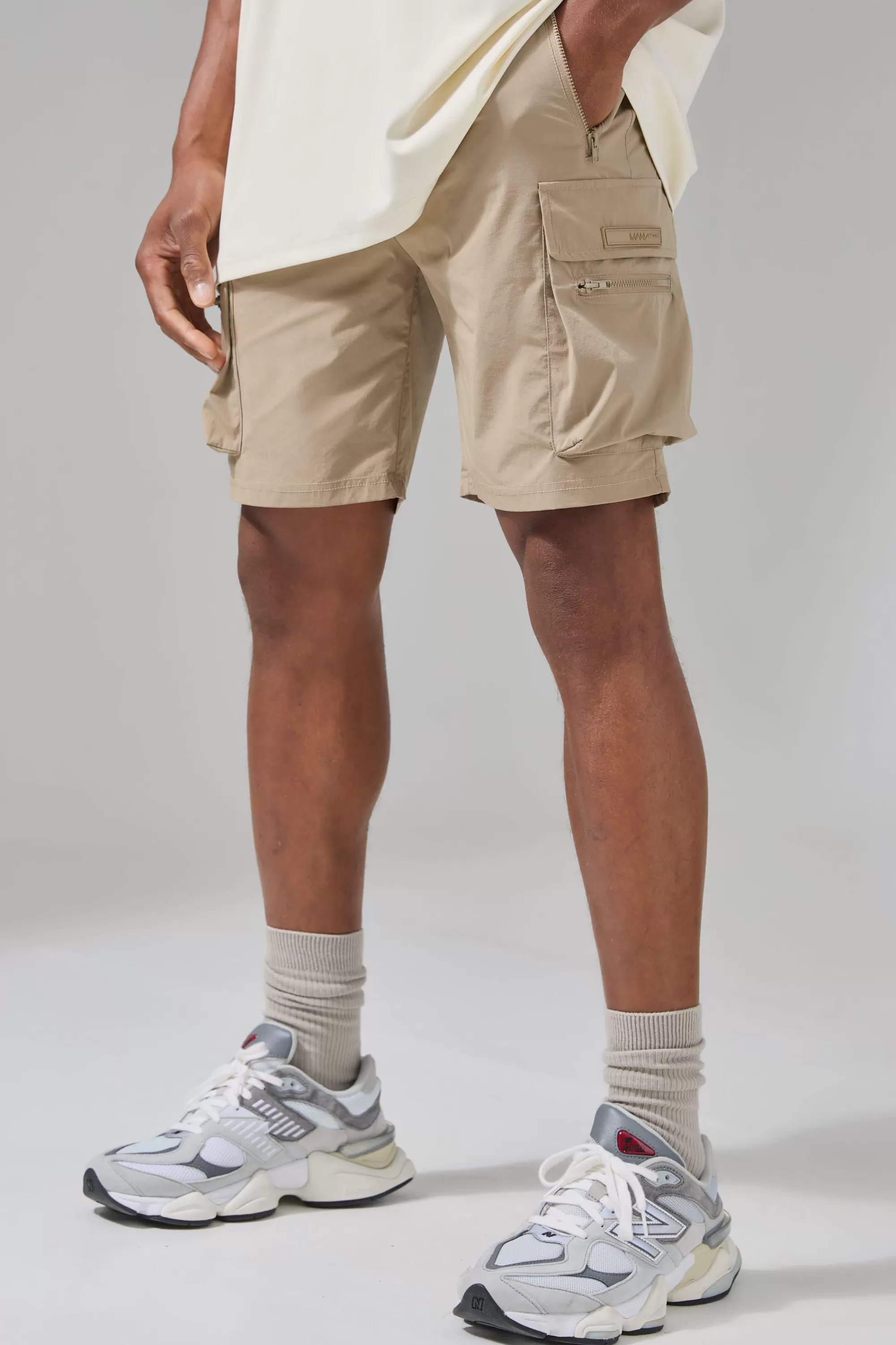 boohooMAN Man Active Lightweight 5inch Slim Cargo Shorts | UK