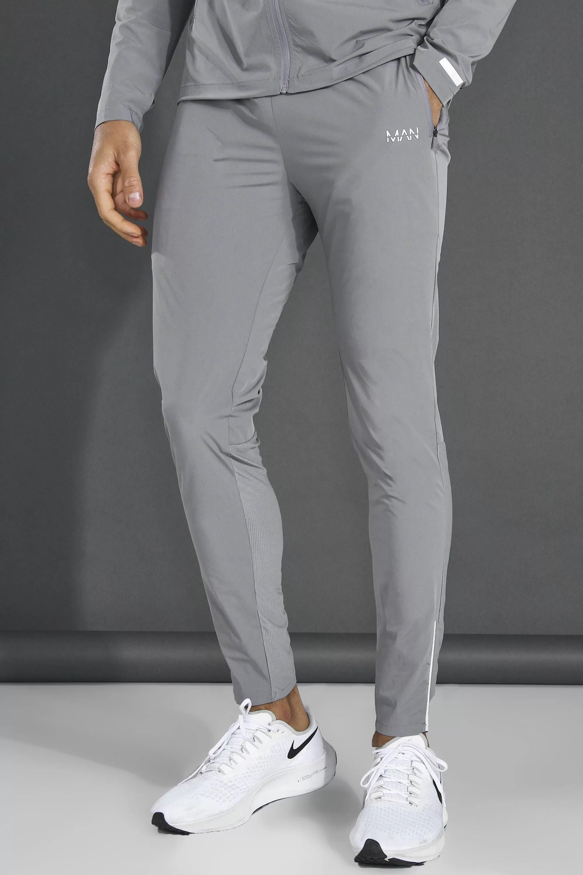 boohooMAN Man Active Lightweight Plain Tapered Track Pant | UK