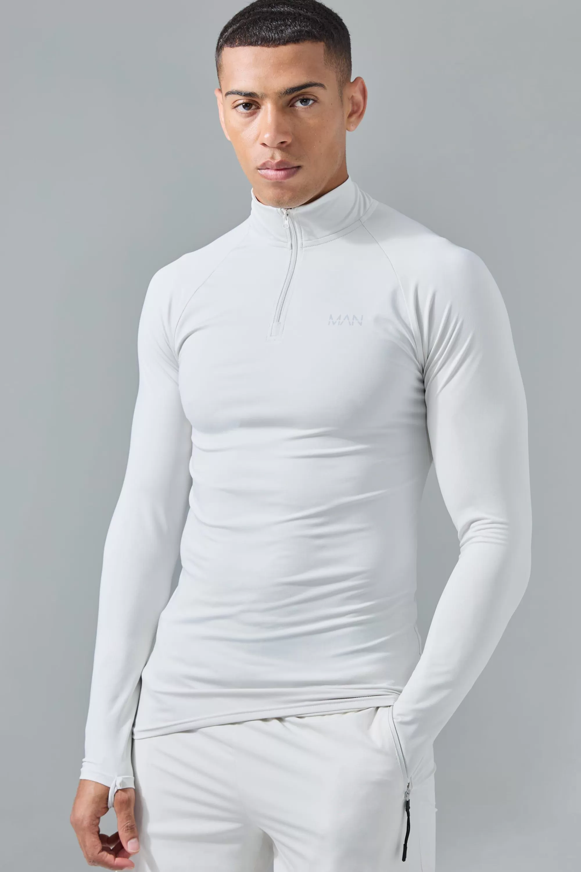 boohooMAN Man Active Muscle Fit 1/4 Zip Top | UK