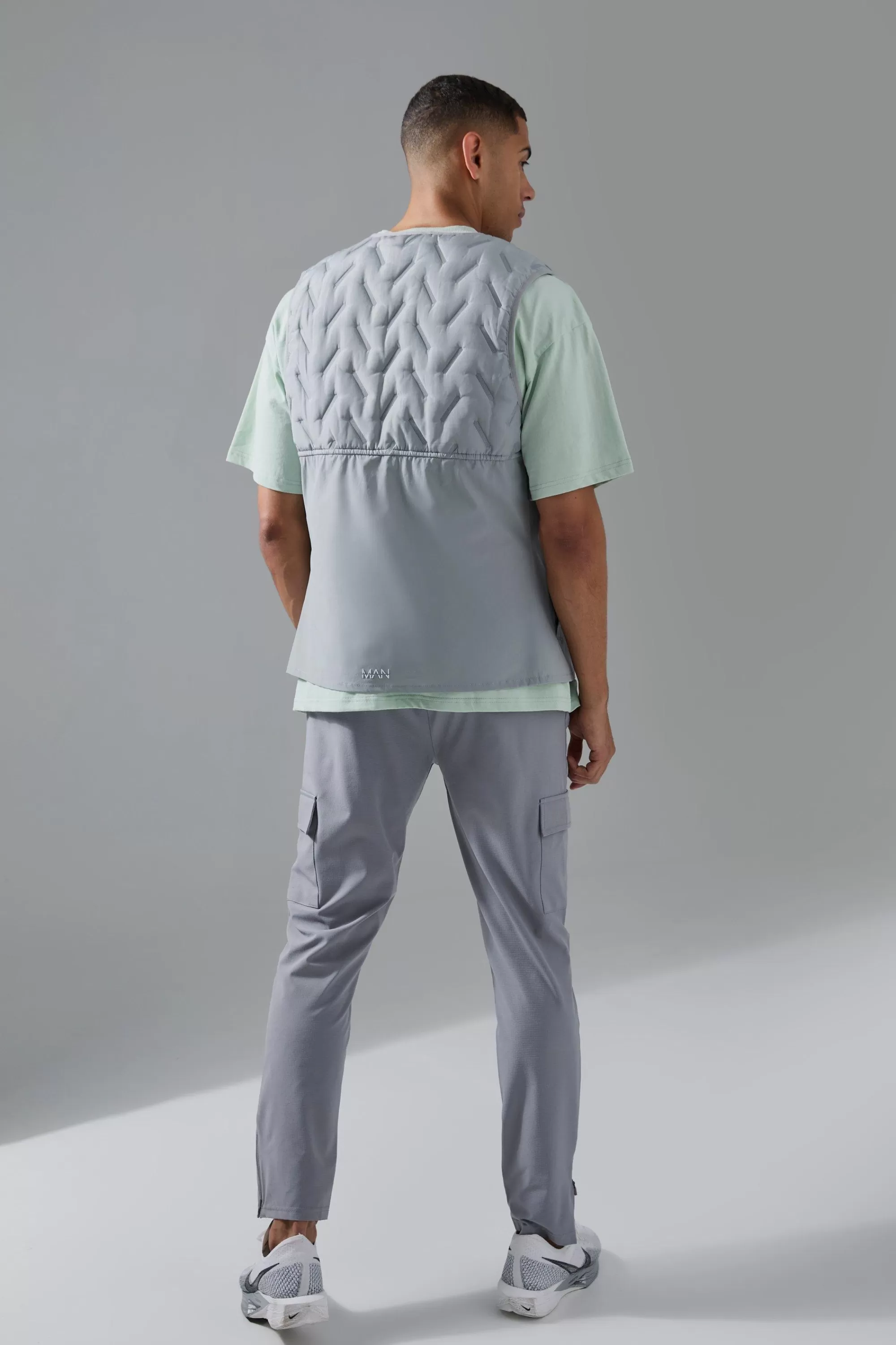 boohooMAN Man Active Quilted Gilet | UK